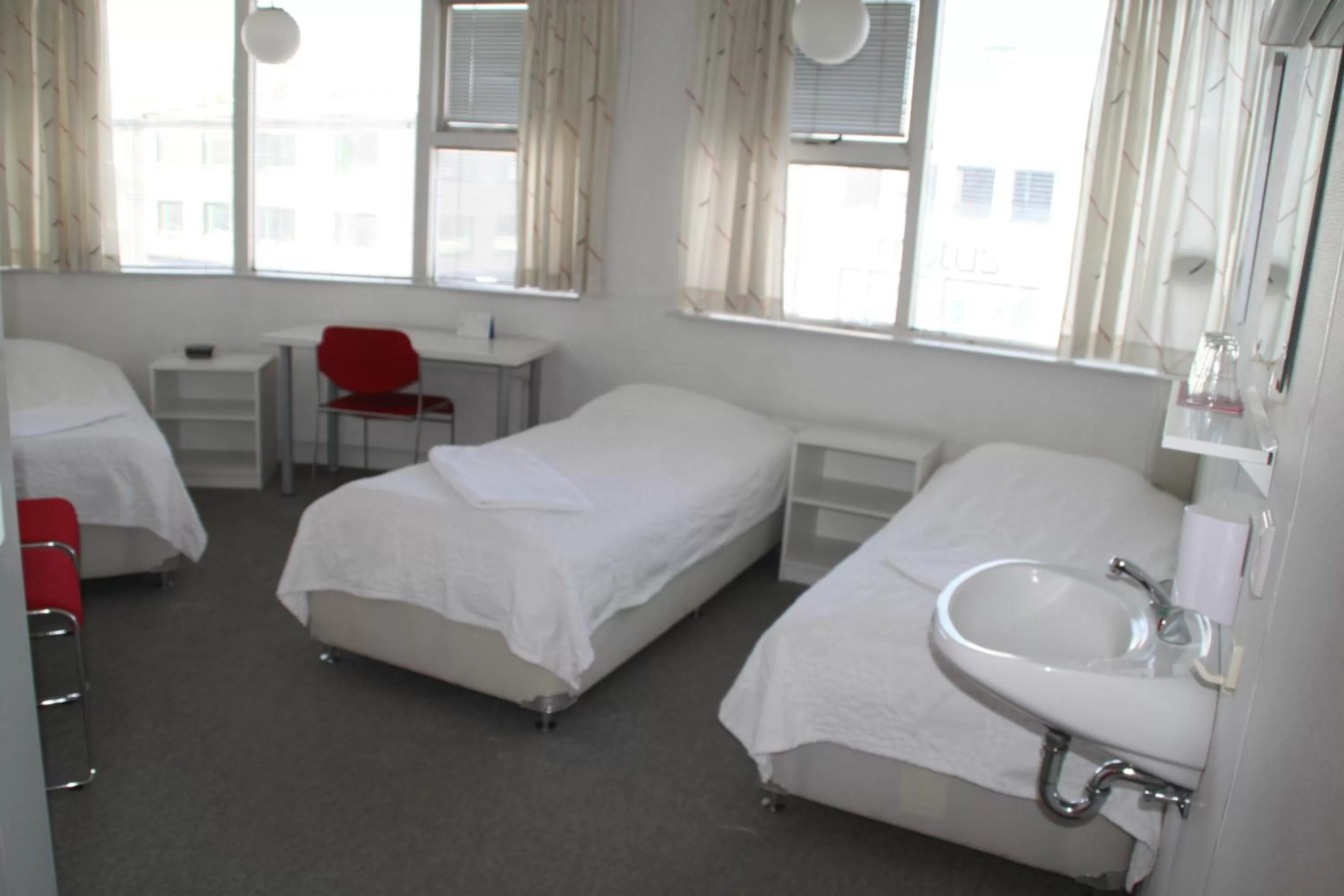 Bed in 101 Guesthouse Hotel