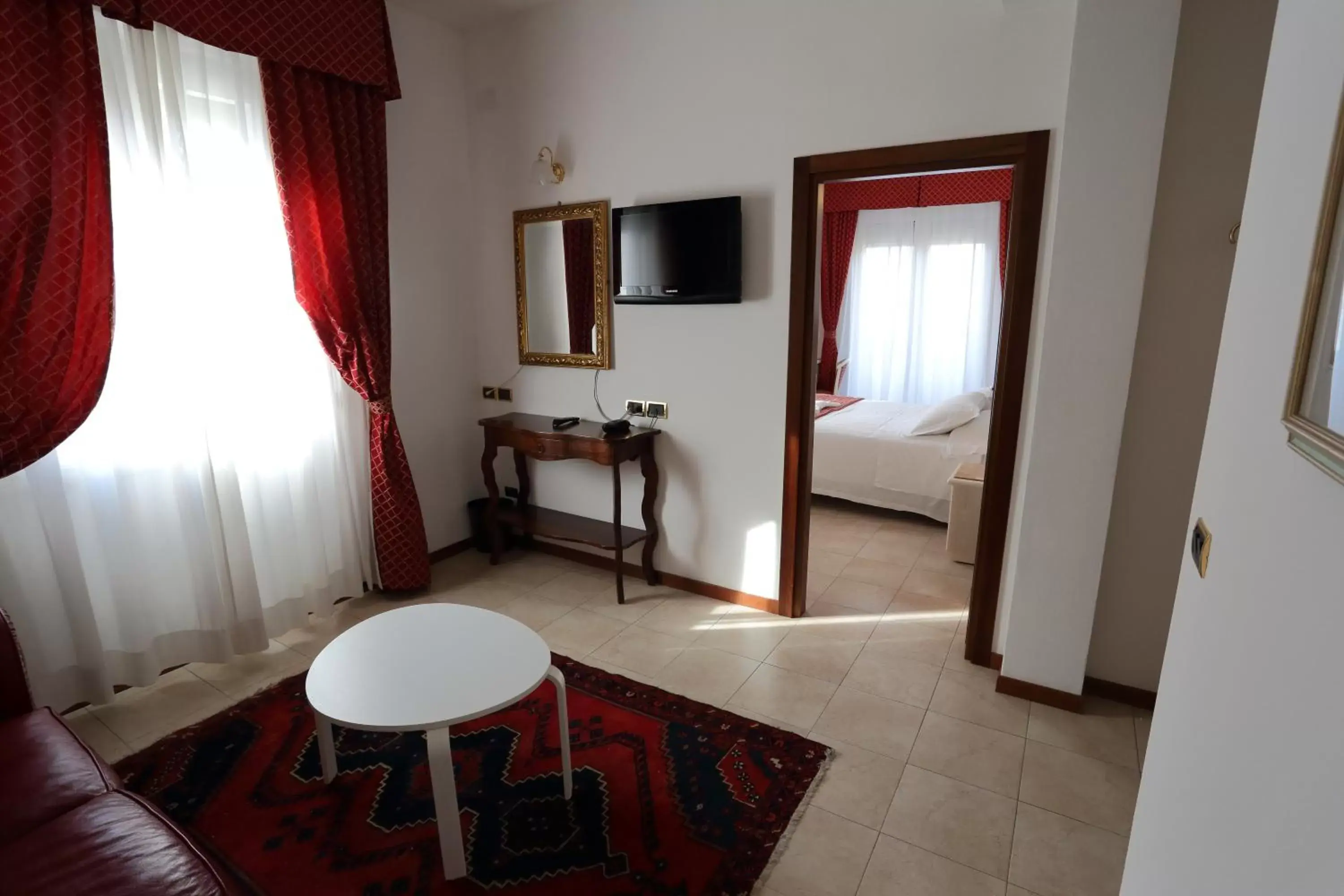 Seating area, TV/Entertainment Center in Hotel Du Soleil