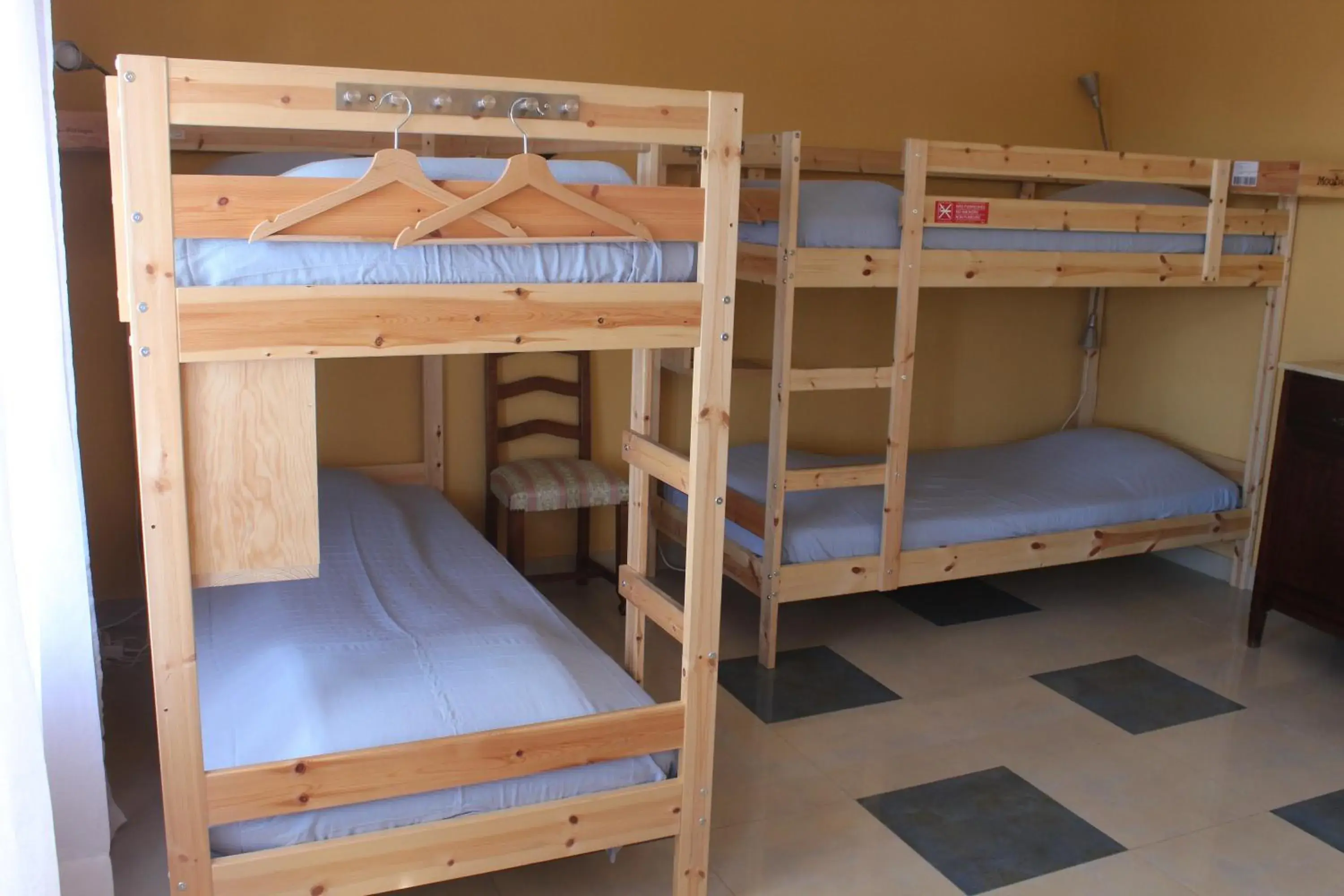 Bed in 8-Bed Dormitory Room in Ericeira Chill Hill Hostel & Private Rooms - Peach Garden