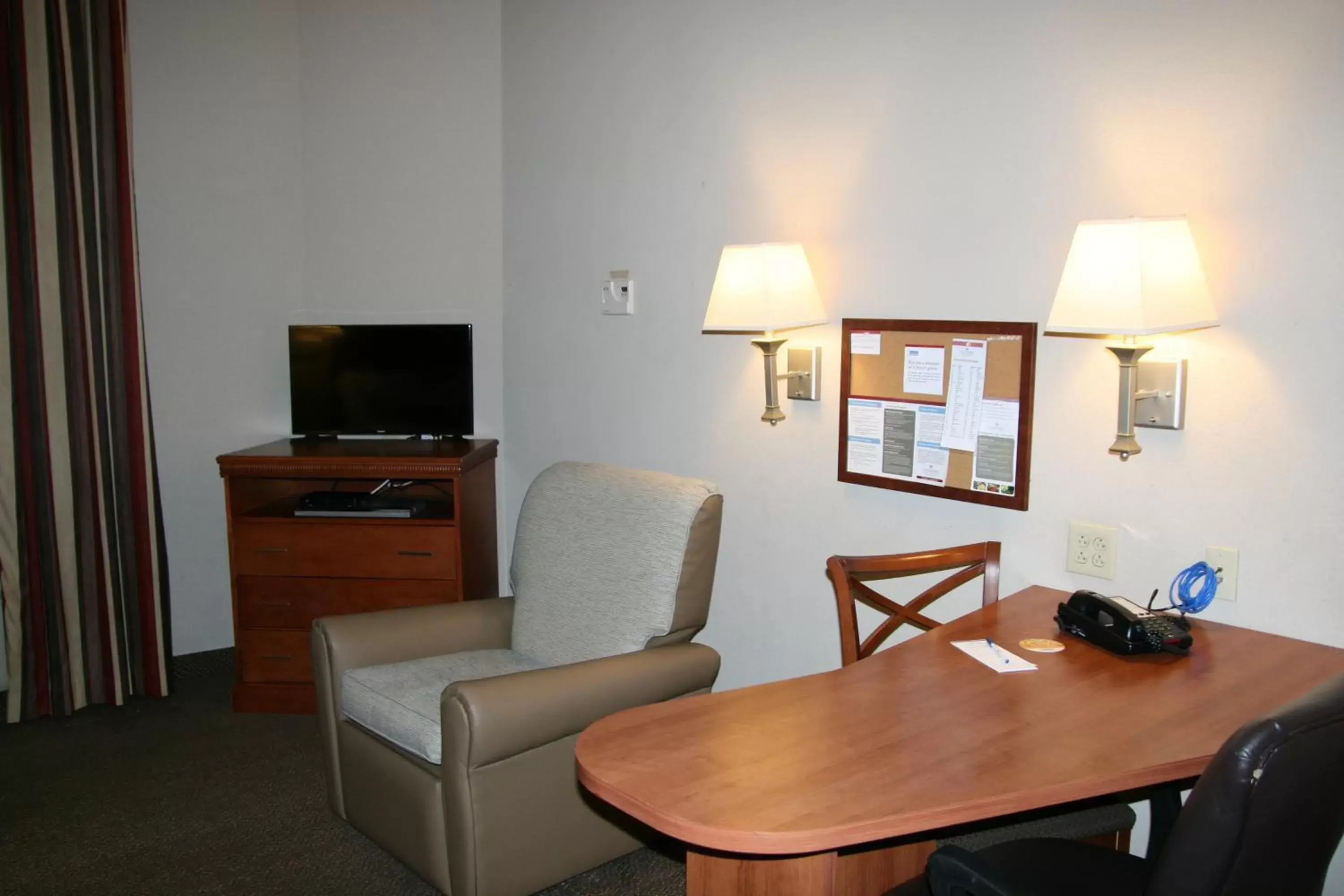 Photo of the whole room, TV/Entertainment Center in Candlewood Suites Bordentown-Trenton, an IHG Hotel