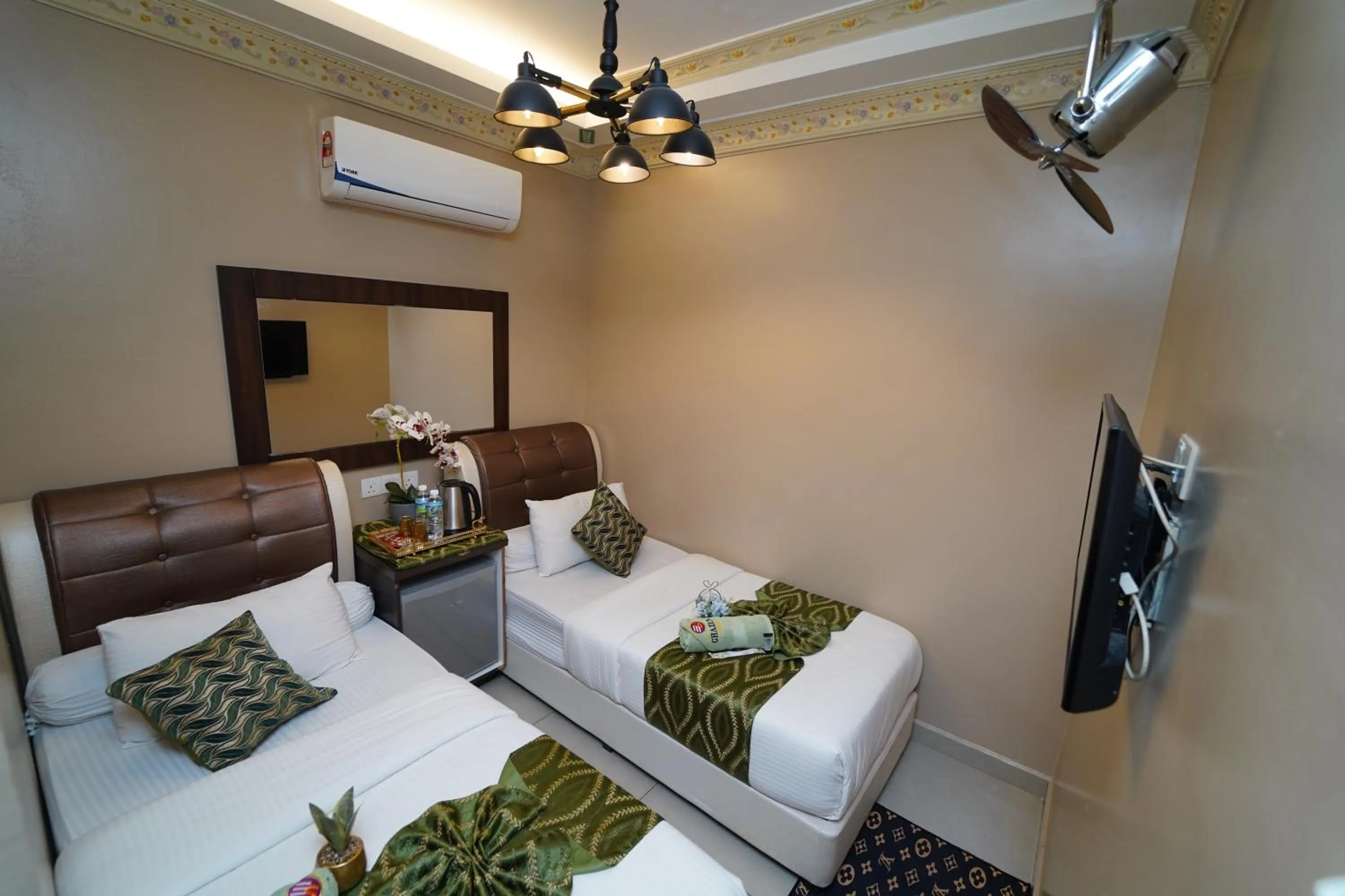 Bed in Ghazrin's Classic Hotel JB