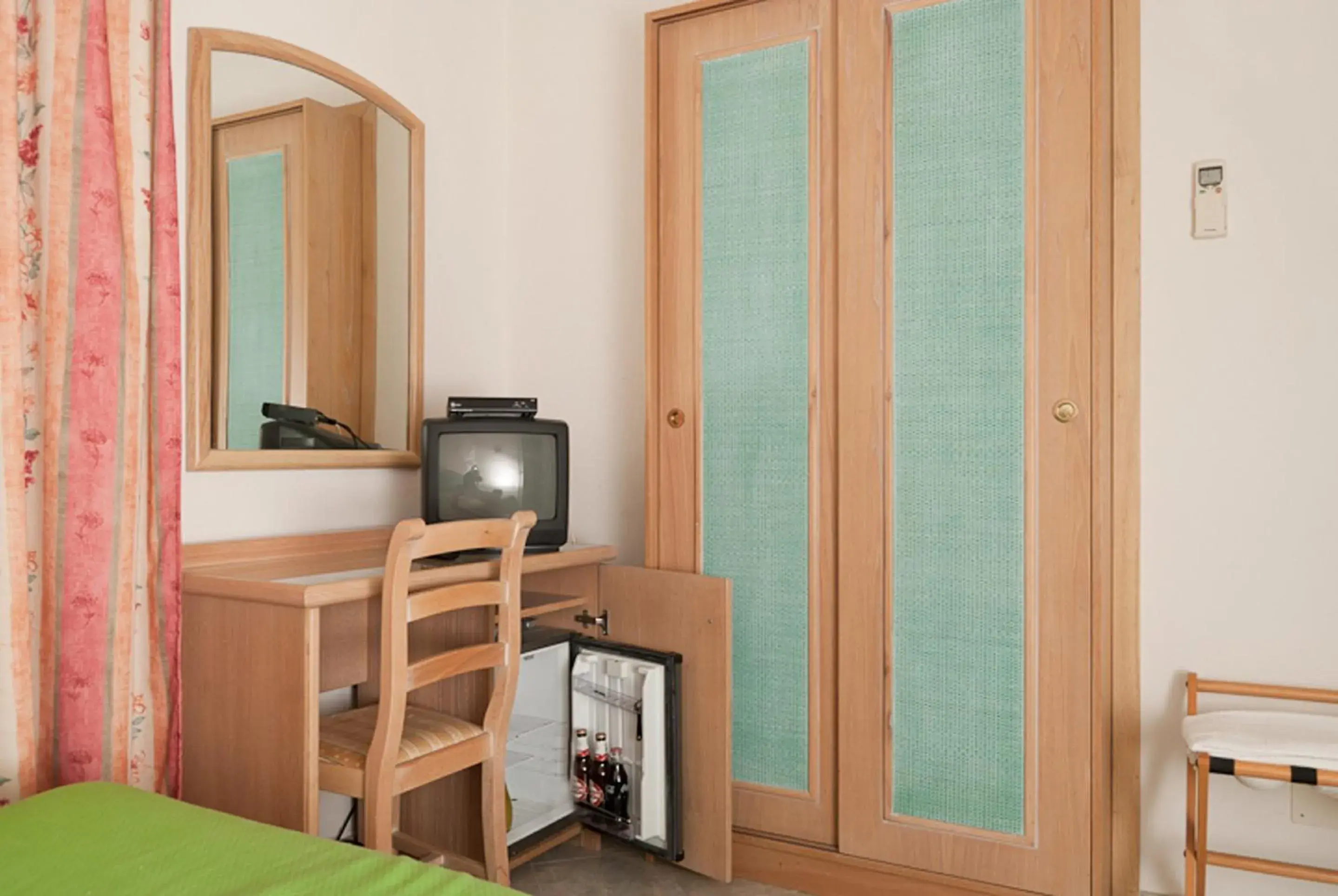 Bedroom, TV/Entertainment Center in Hotel Del Postiglione