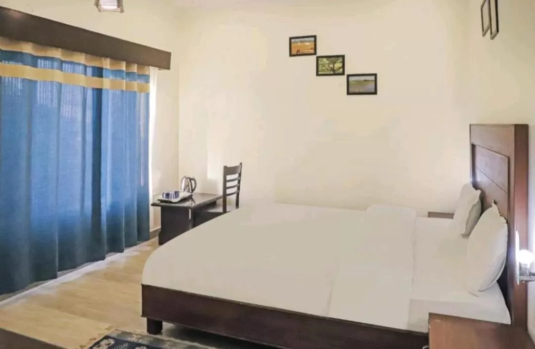 Bed in Hotel Ramayana Khajuraho