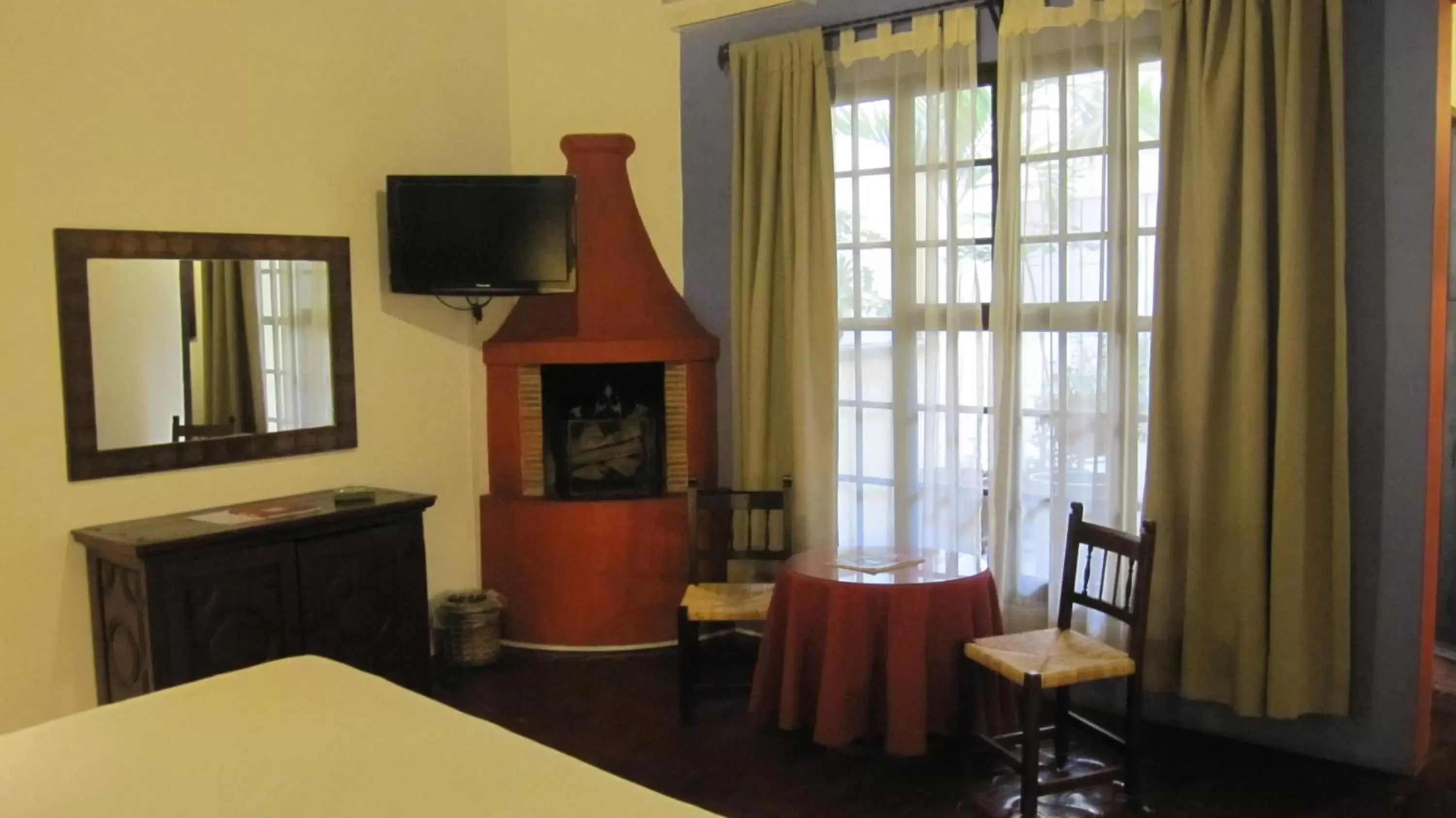 TV and multimedia, TV/Entertainment Center in Hotel Casa Colonial - Adults Only