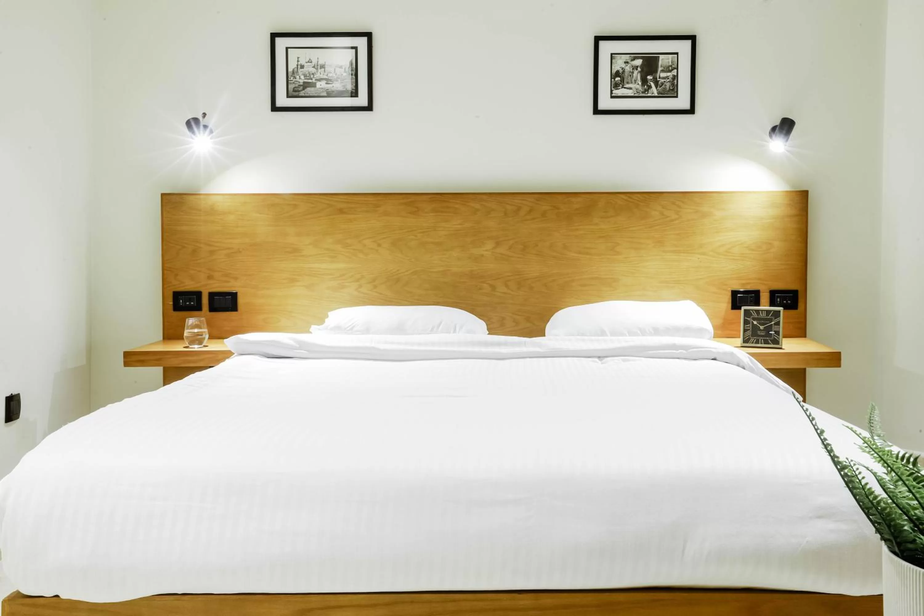 Bed in NewCity Hotel & Suites