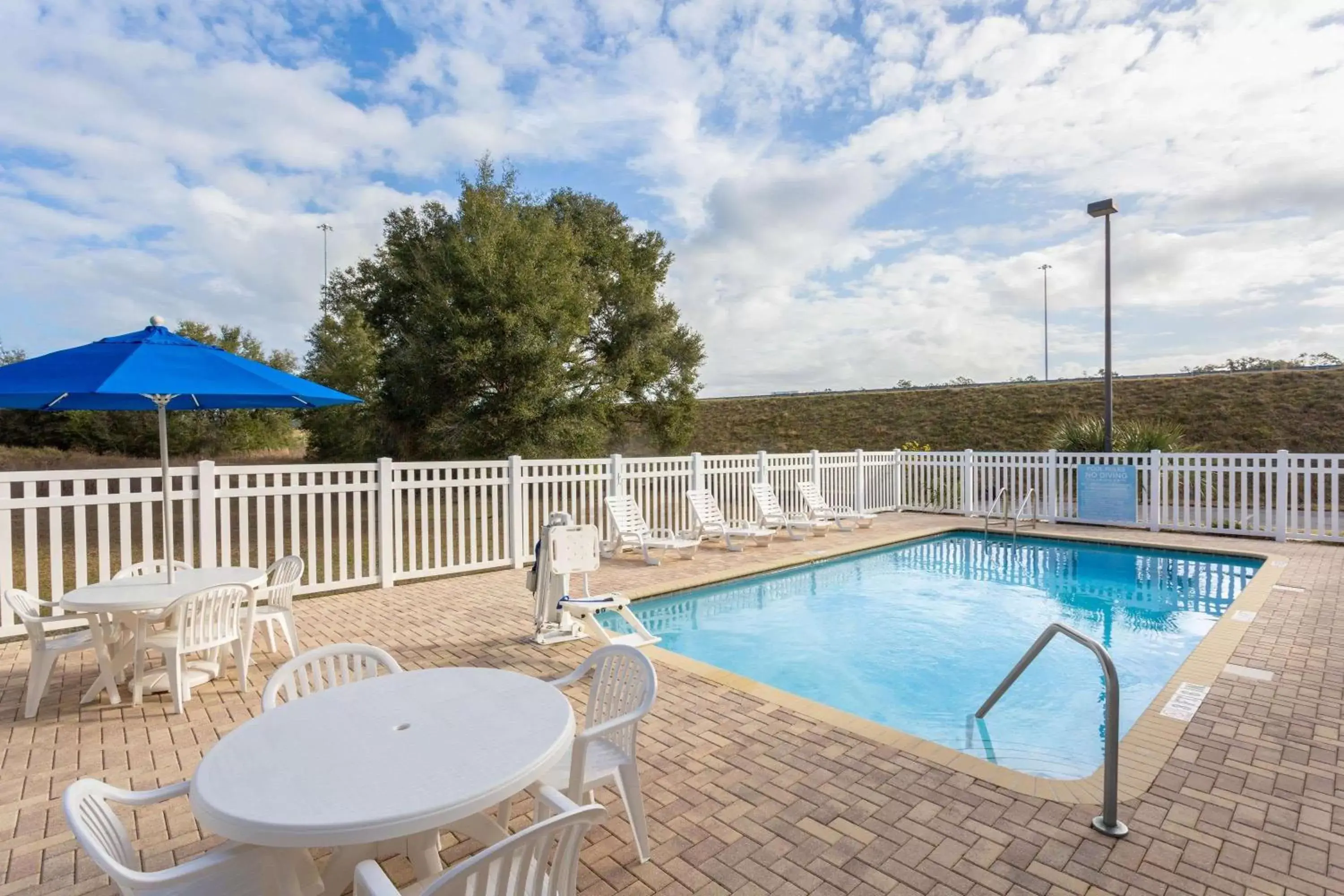 On site, Swimming Pool in Microtel Inn & Suites by Wyndham Brooksville