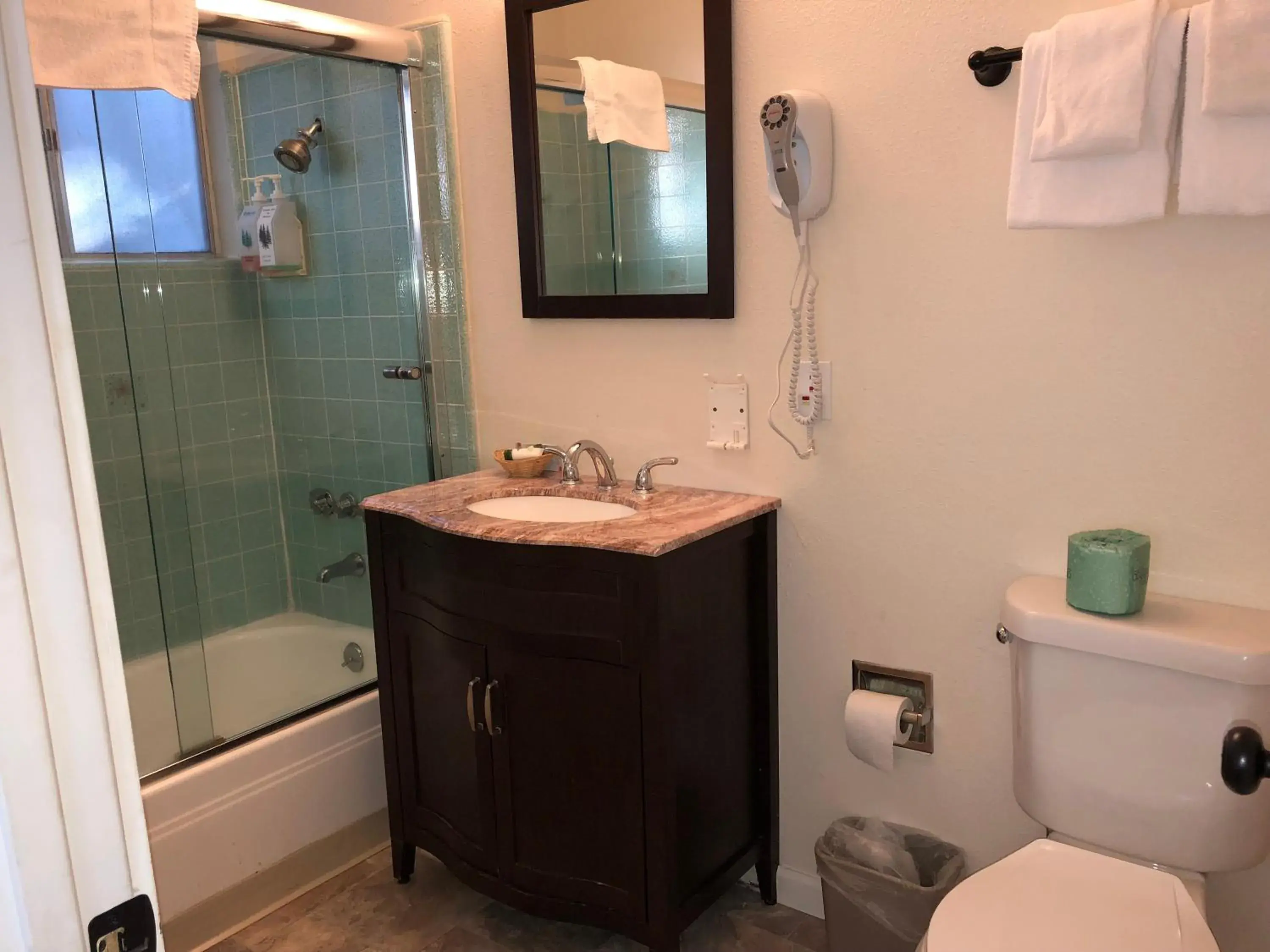 Bathroom in Cedar Inn & Suites