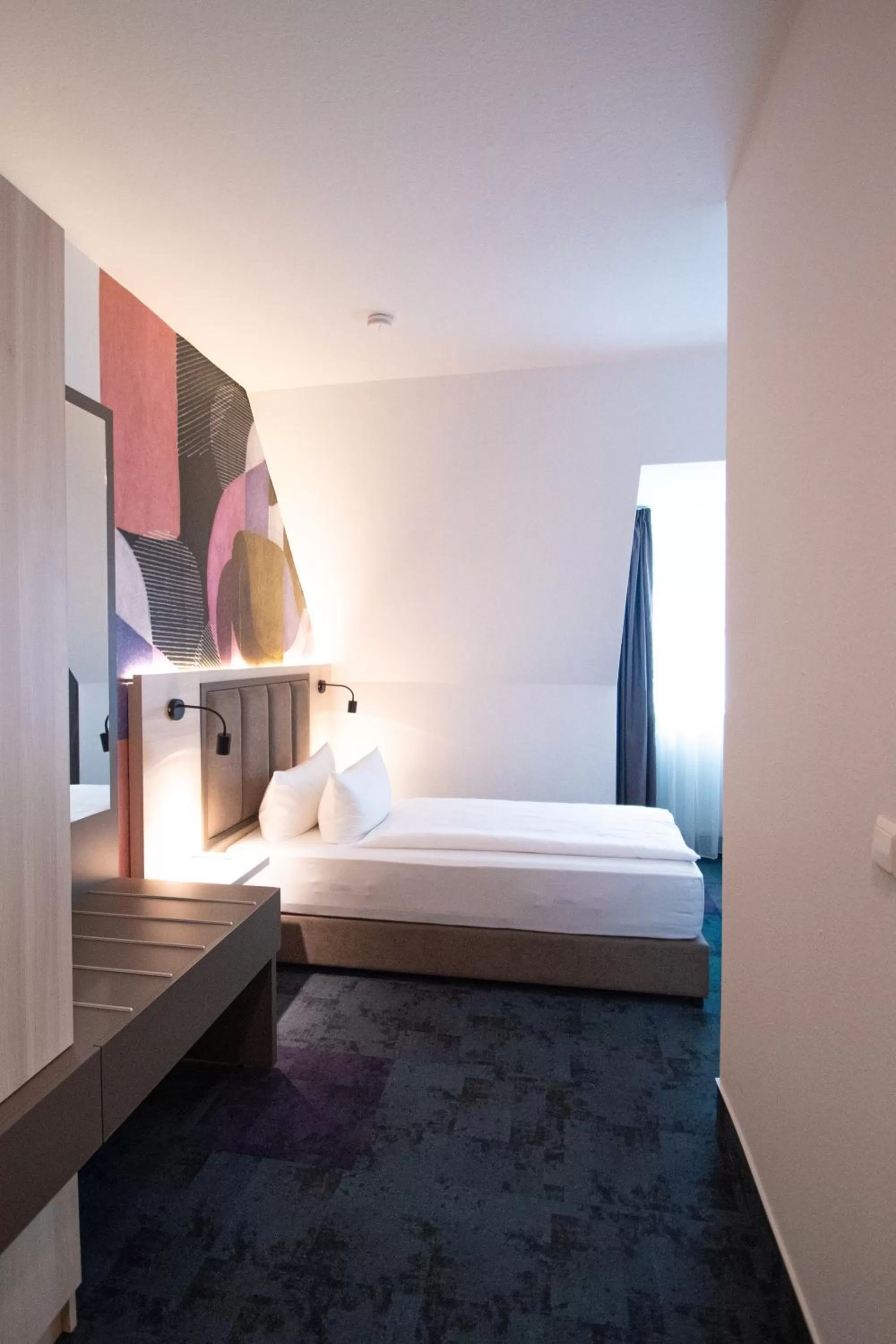 Photo of the whole room, Bed in Taste Hotel Kulmbach