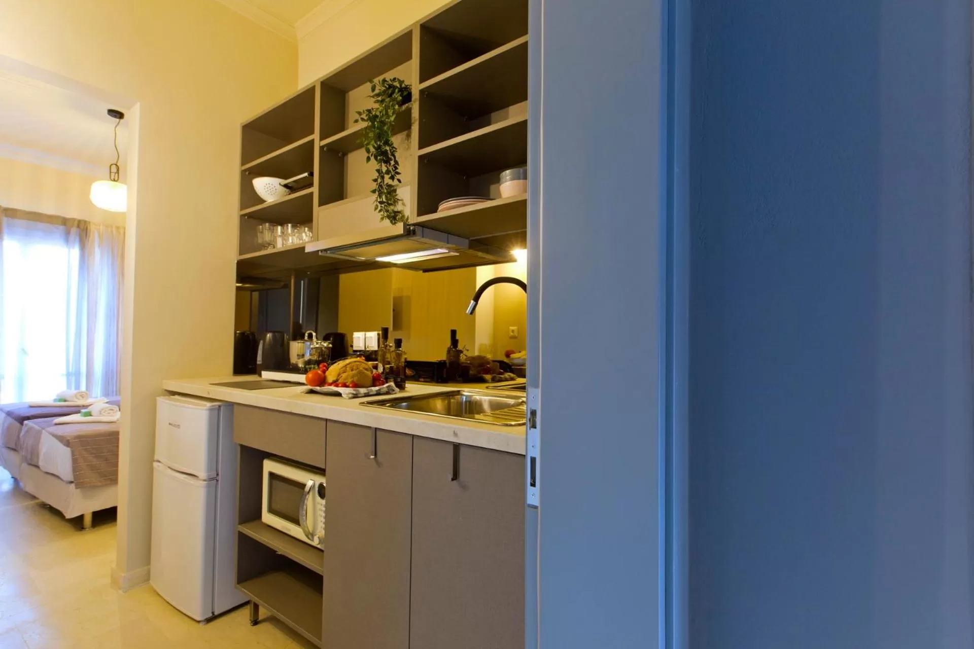 Kitchen or kitchenette in LOC HOSPITALITY Urban Suites