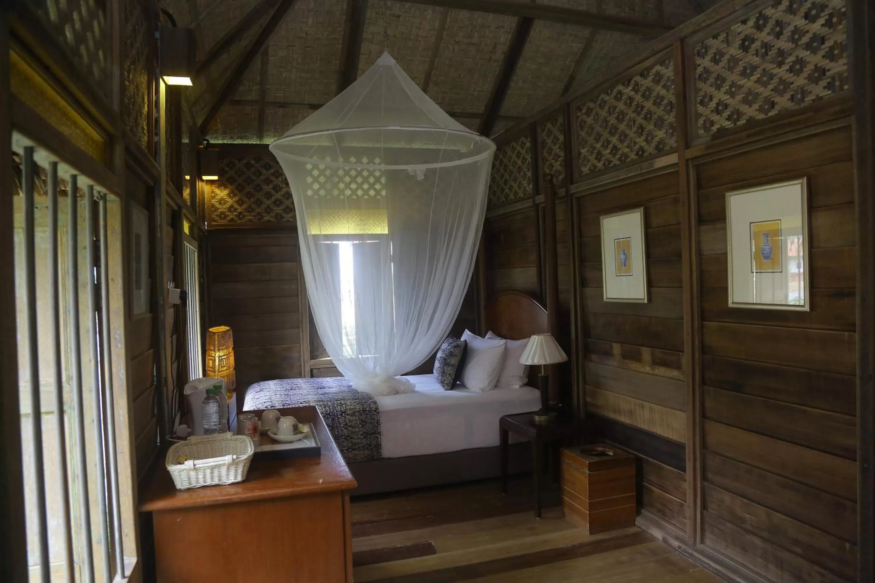 Bed in Kunang Kunang Heritage Villas