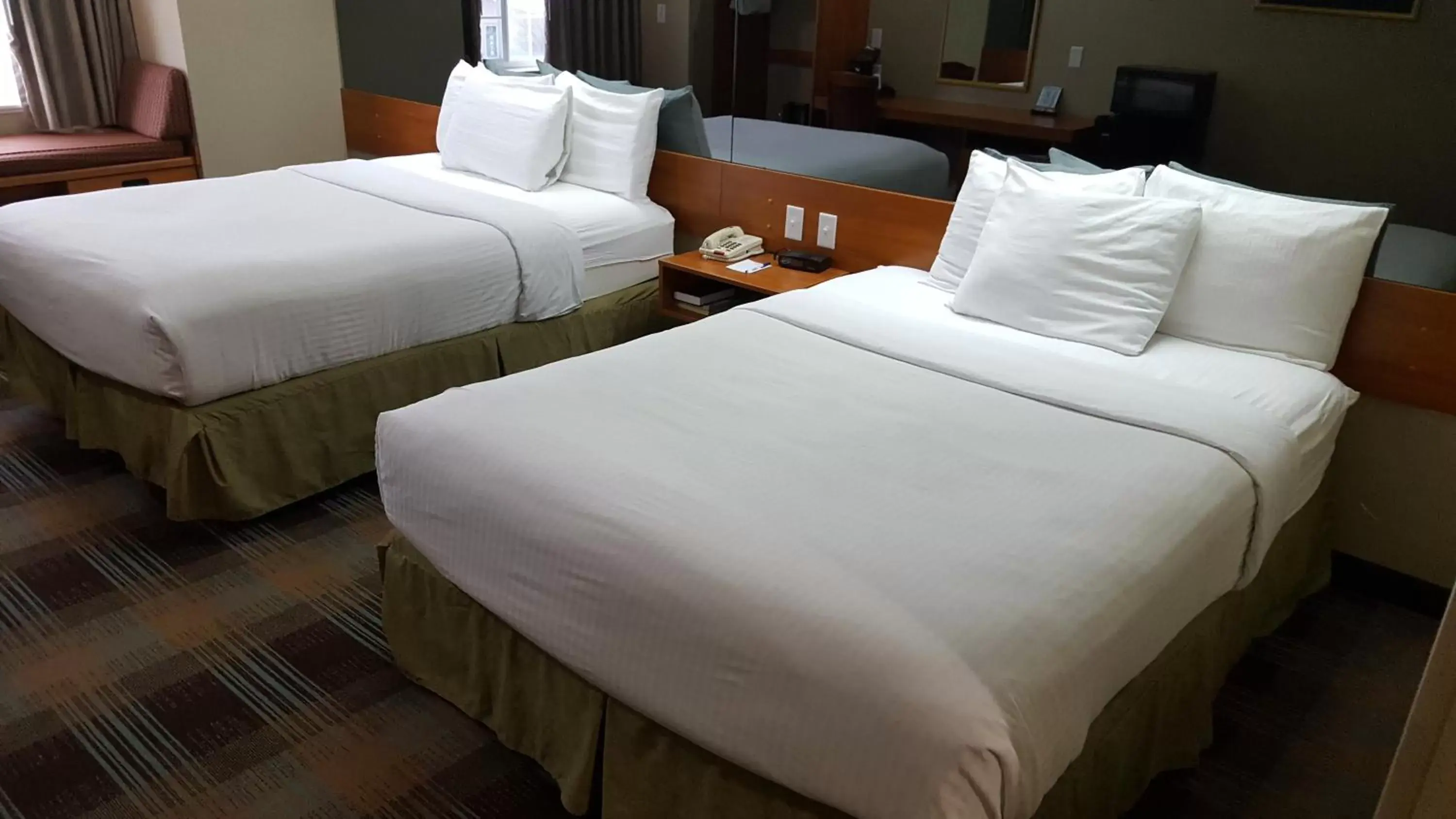 Photo of the whole room, Bed in Microtel Inn & Suites by Wyndham Bozeman