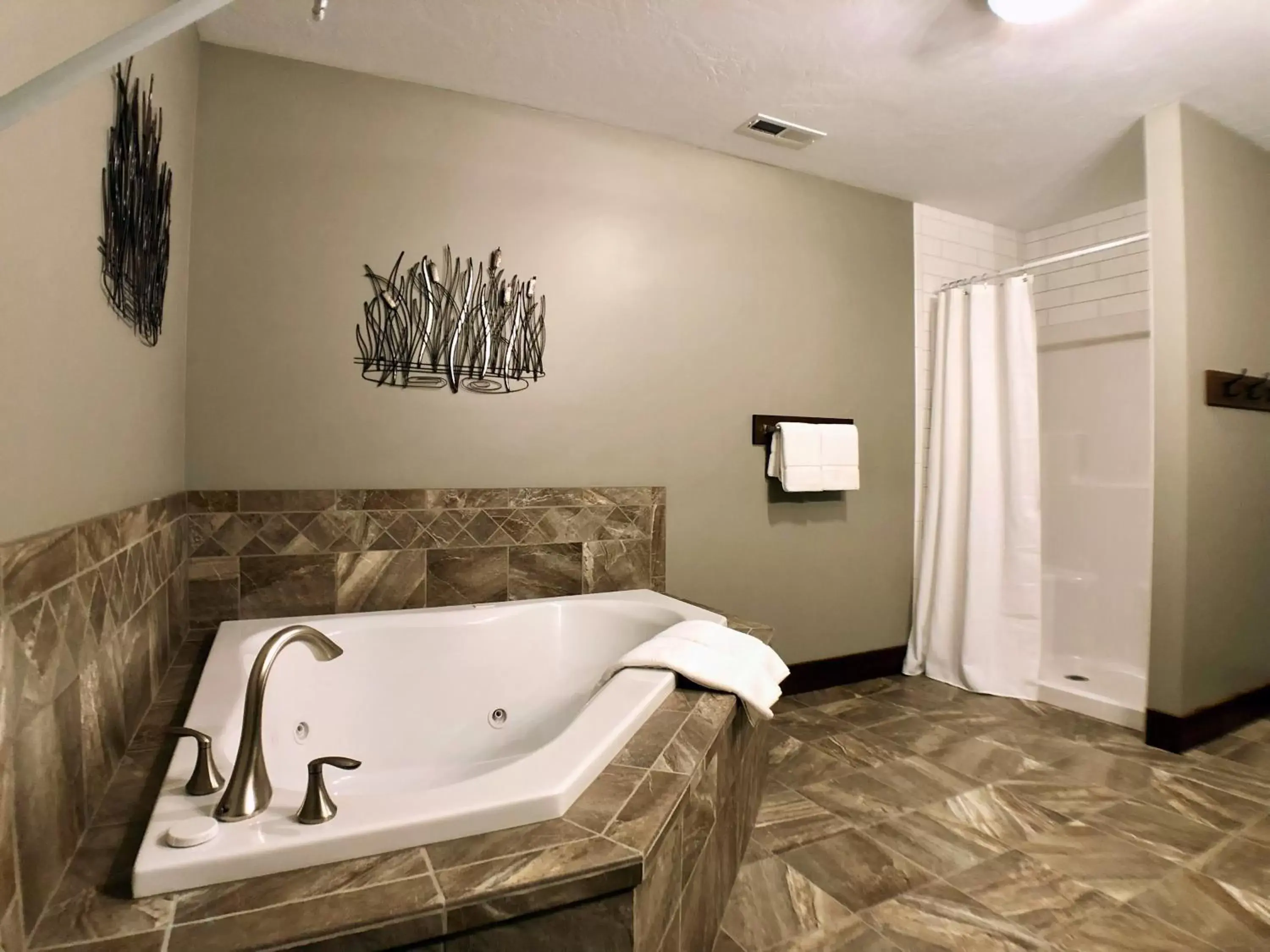 Bathroom in Sojourner's Lodge & Log Cabin Suites