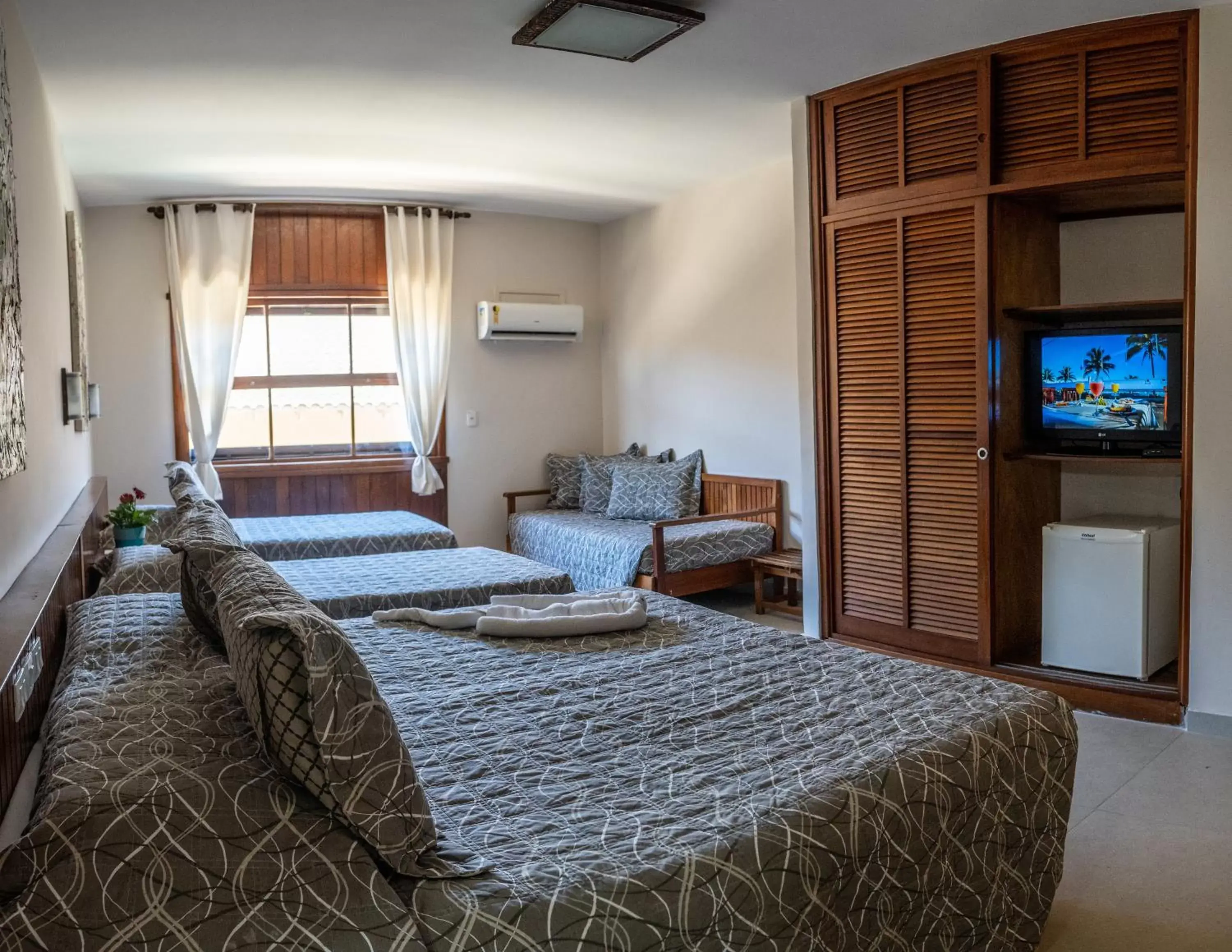 Bedroom, Bed in Strand Hotel Guarujá Frente Mar