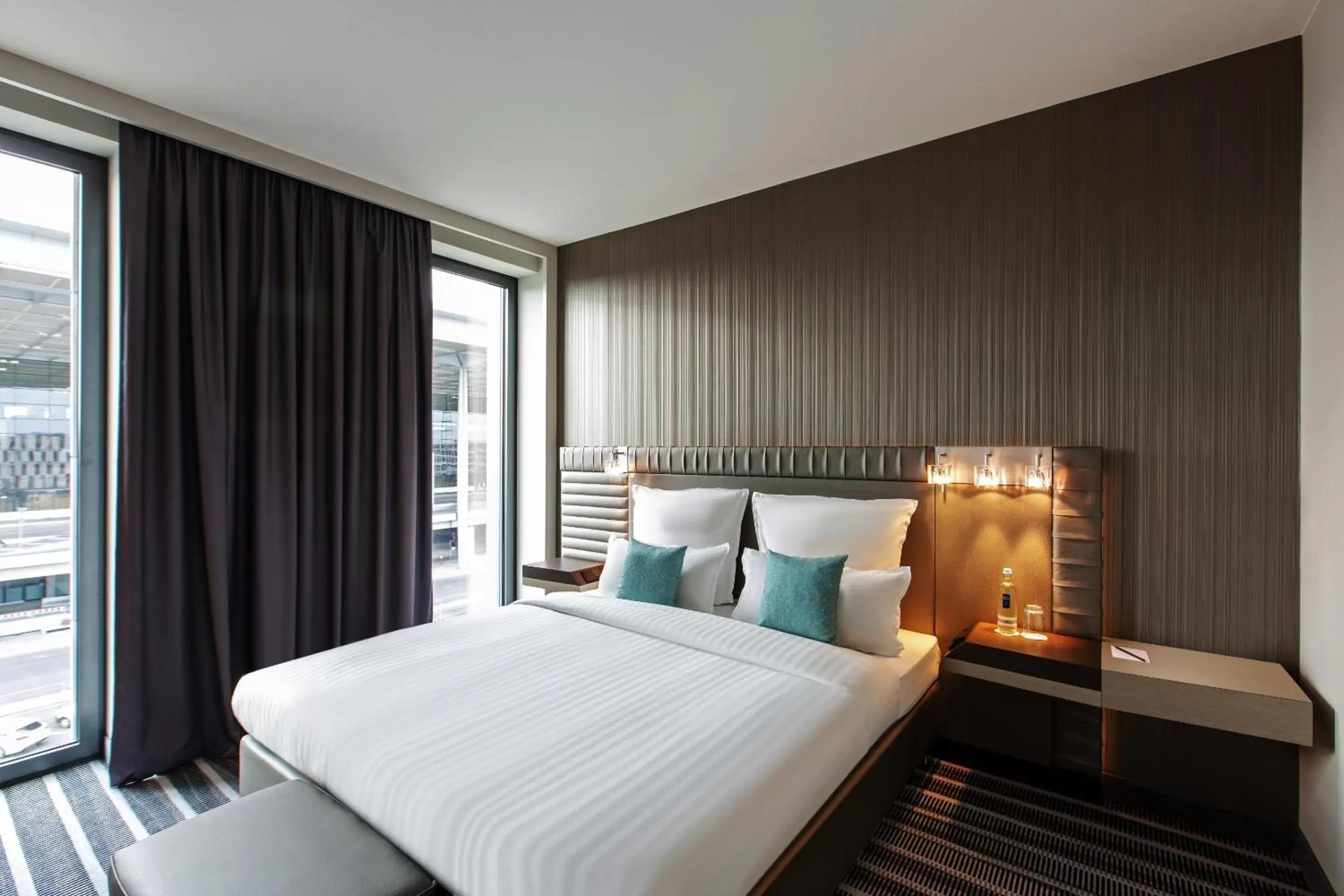 Photo of the whole room, Bed in Steigenberger Airport Hotel Berlin