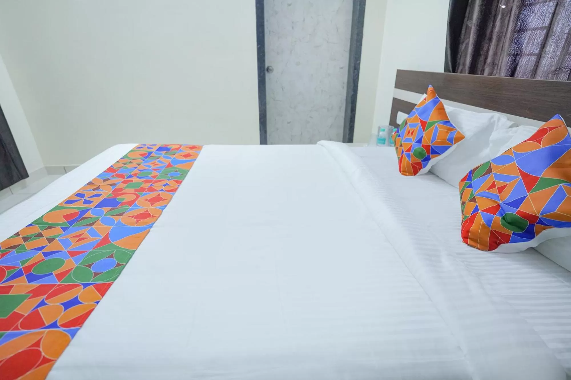 Bed in FabExpress Town Space Apartment