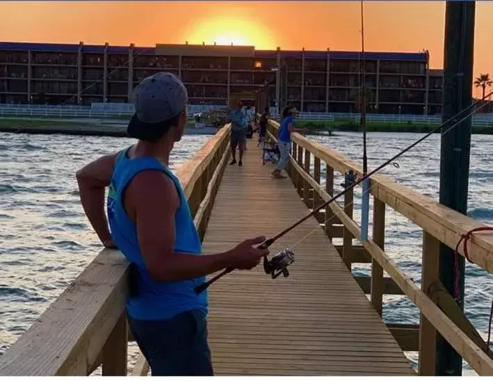 Fishing in Benjamin's Pier at Laguna Reef Resort