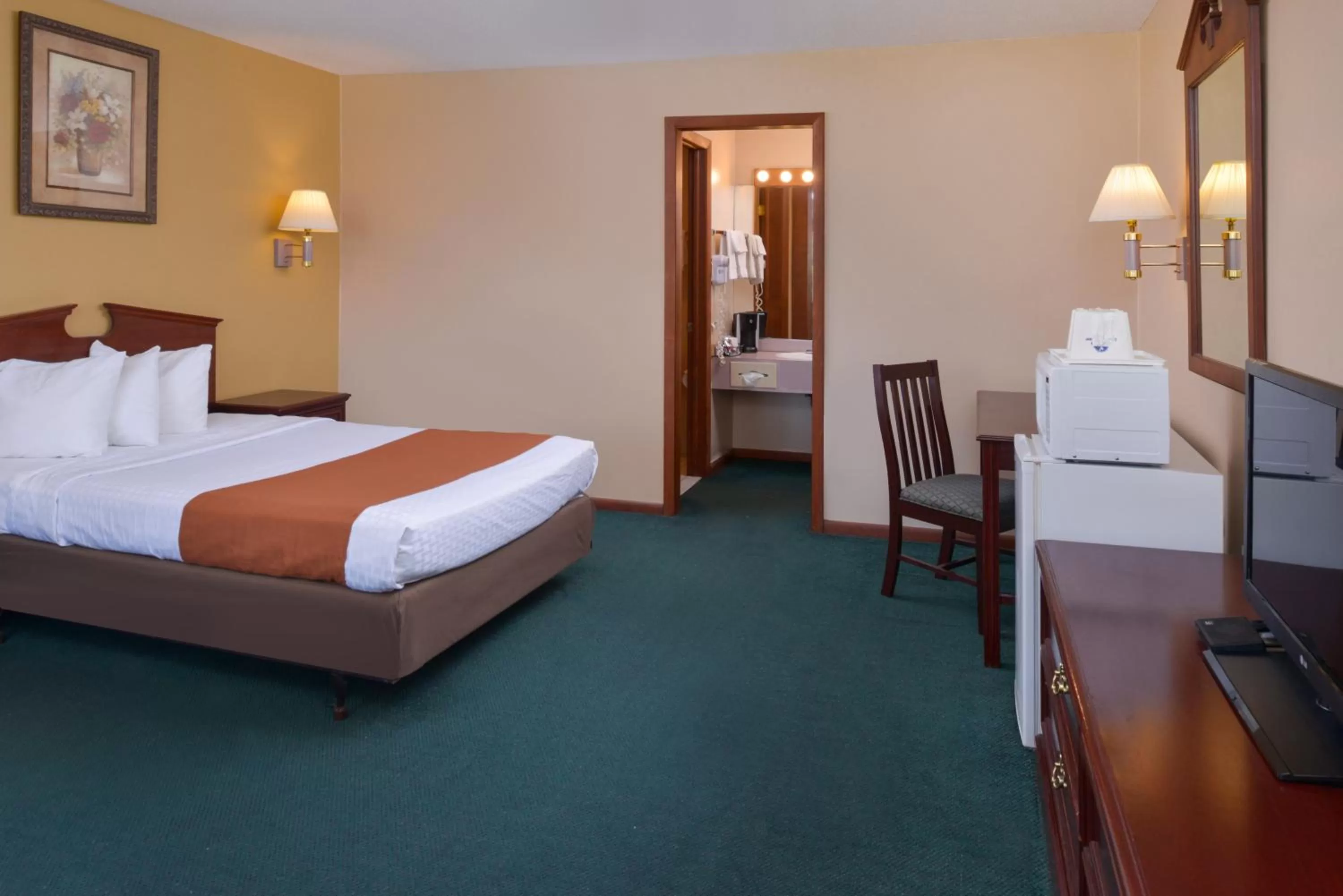 Bed in Americas Best Value Inn Plattsburgh