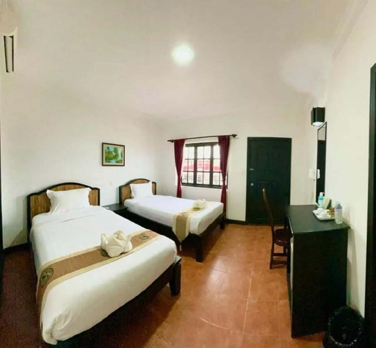 Photo of the whole room, Bed in Angkor Tiger Resort