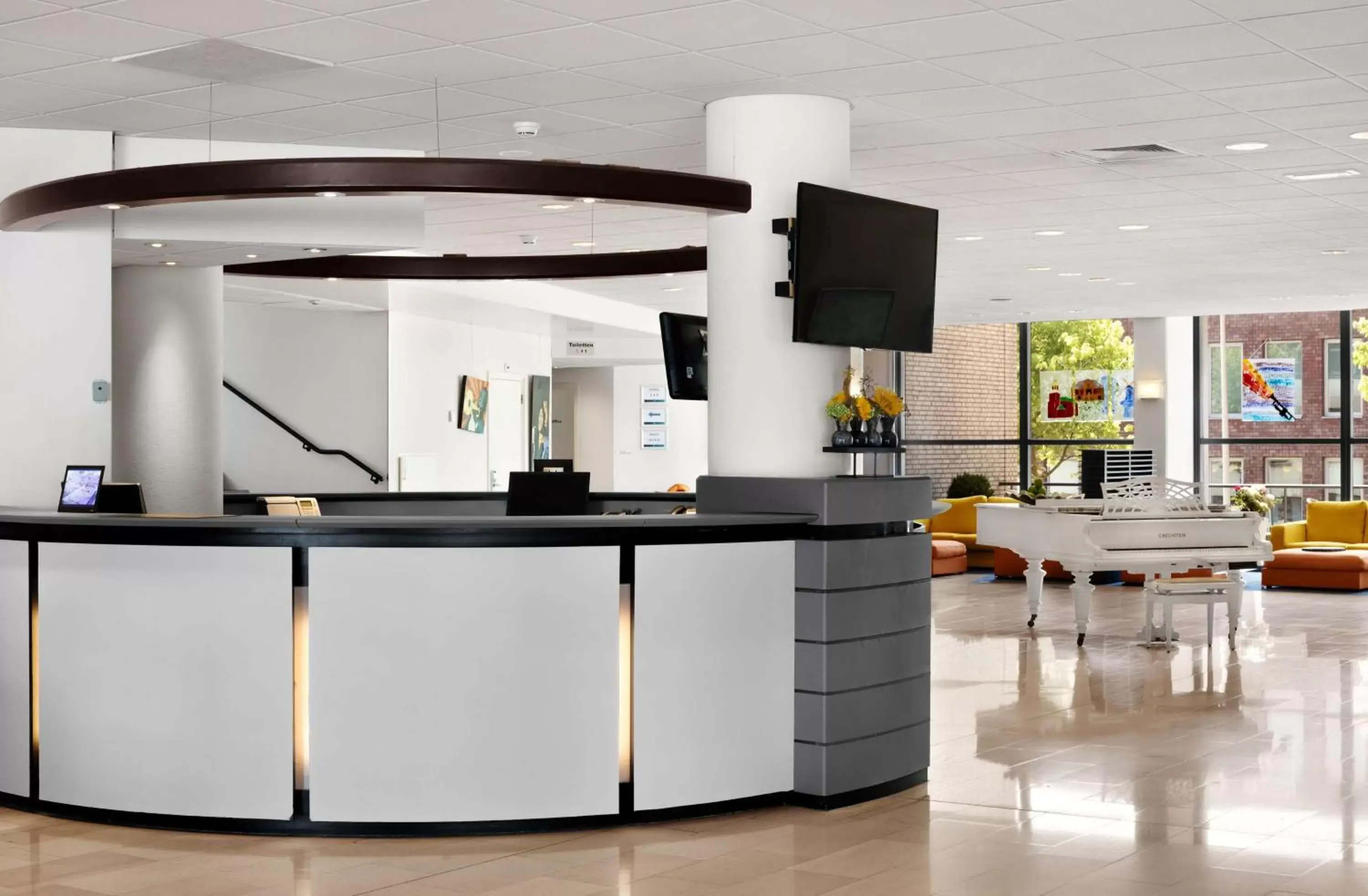 Lobby or reception in NH Zoetermeer Hotel