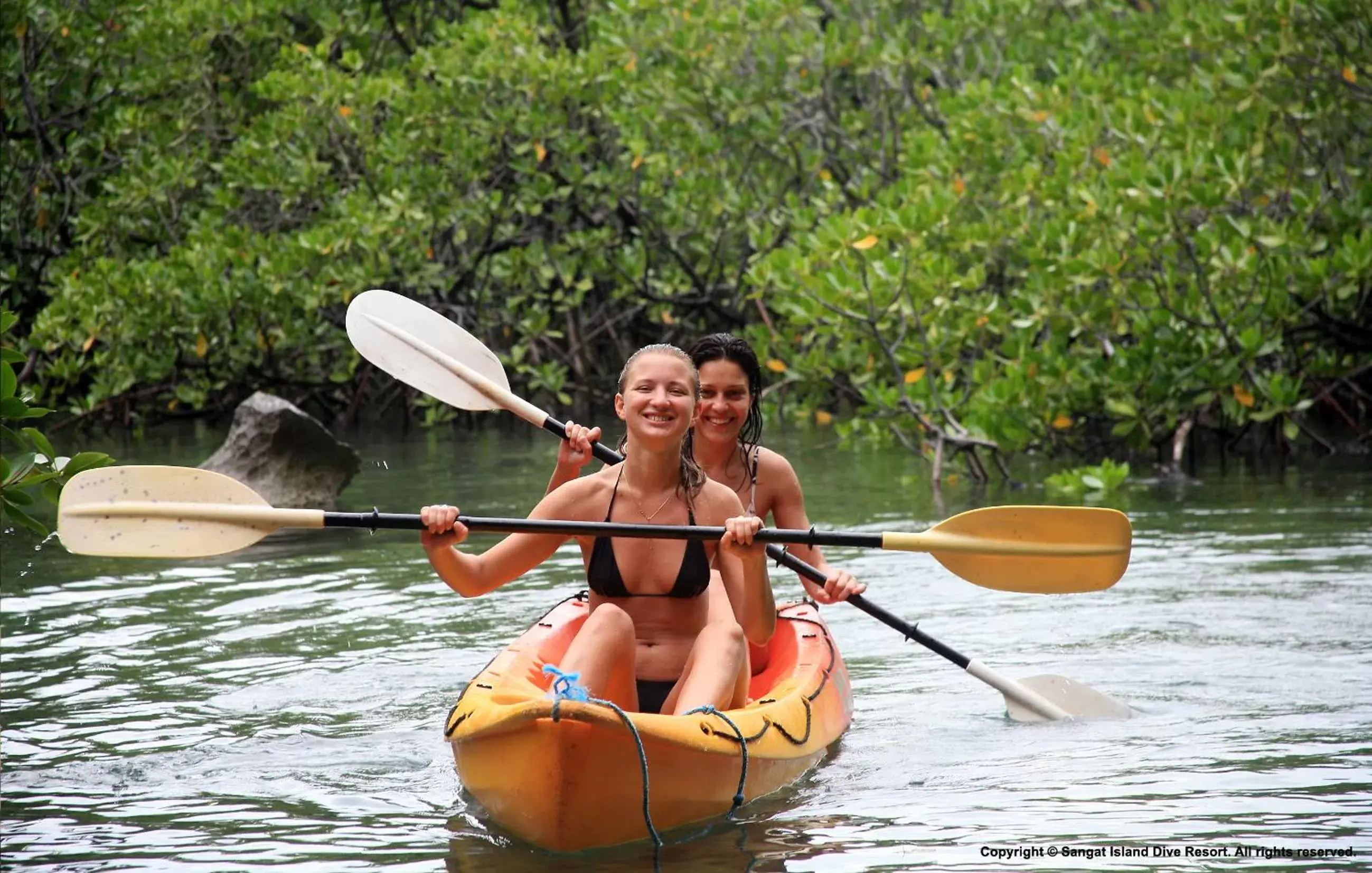 Canoeing in Sangat Island Dive Resort