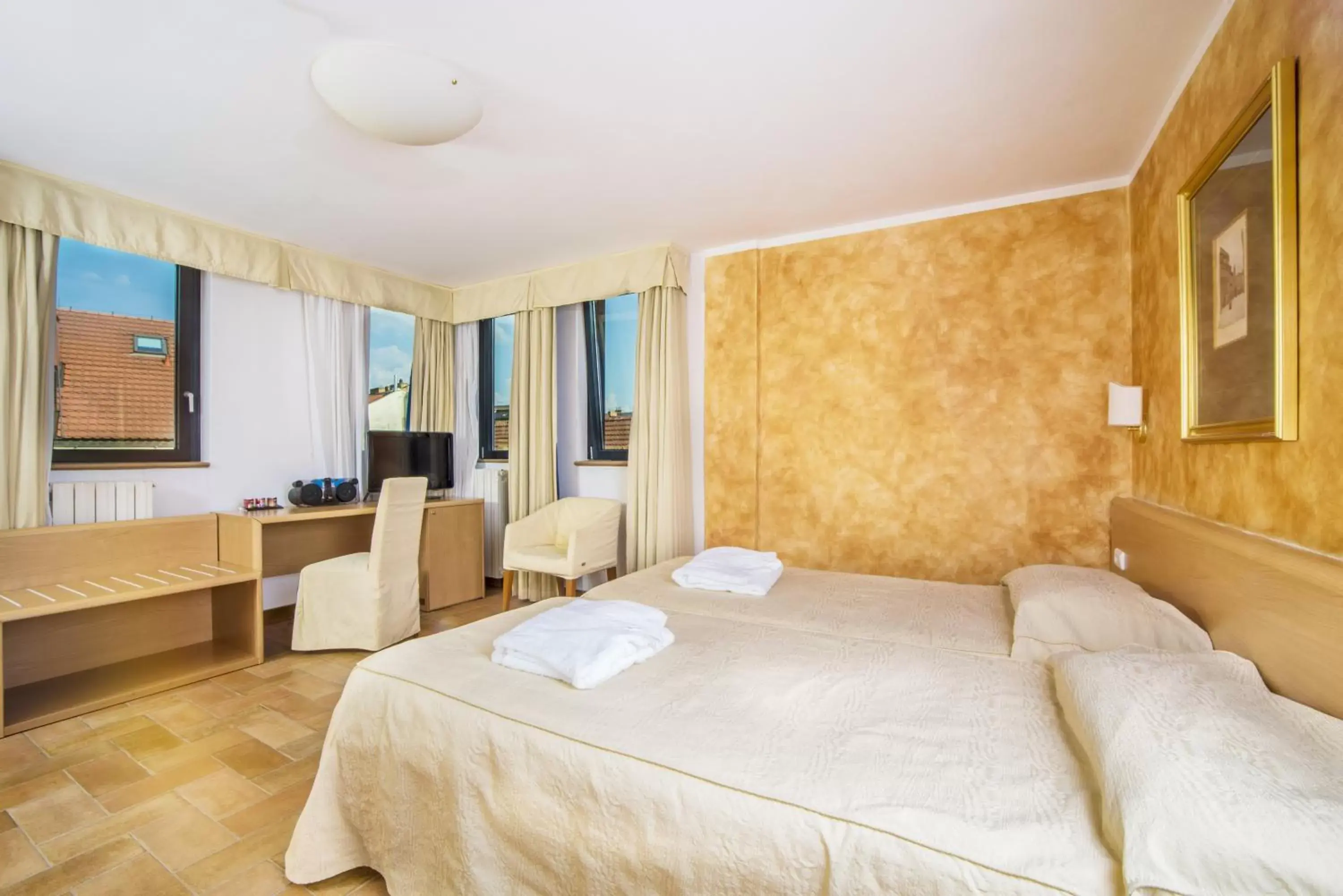 Photo of the whole room, Bed in Hotel Roma Prague