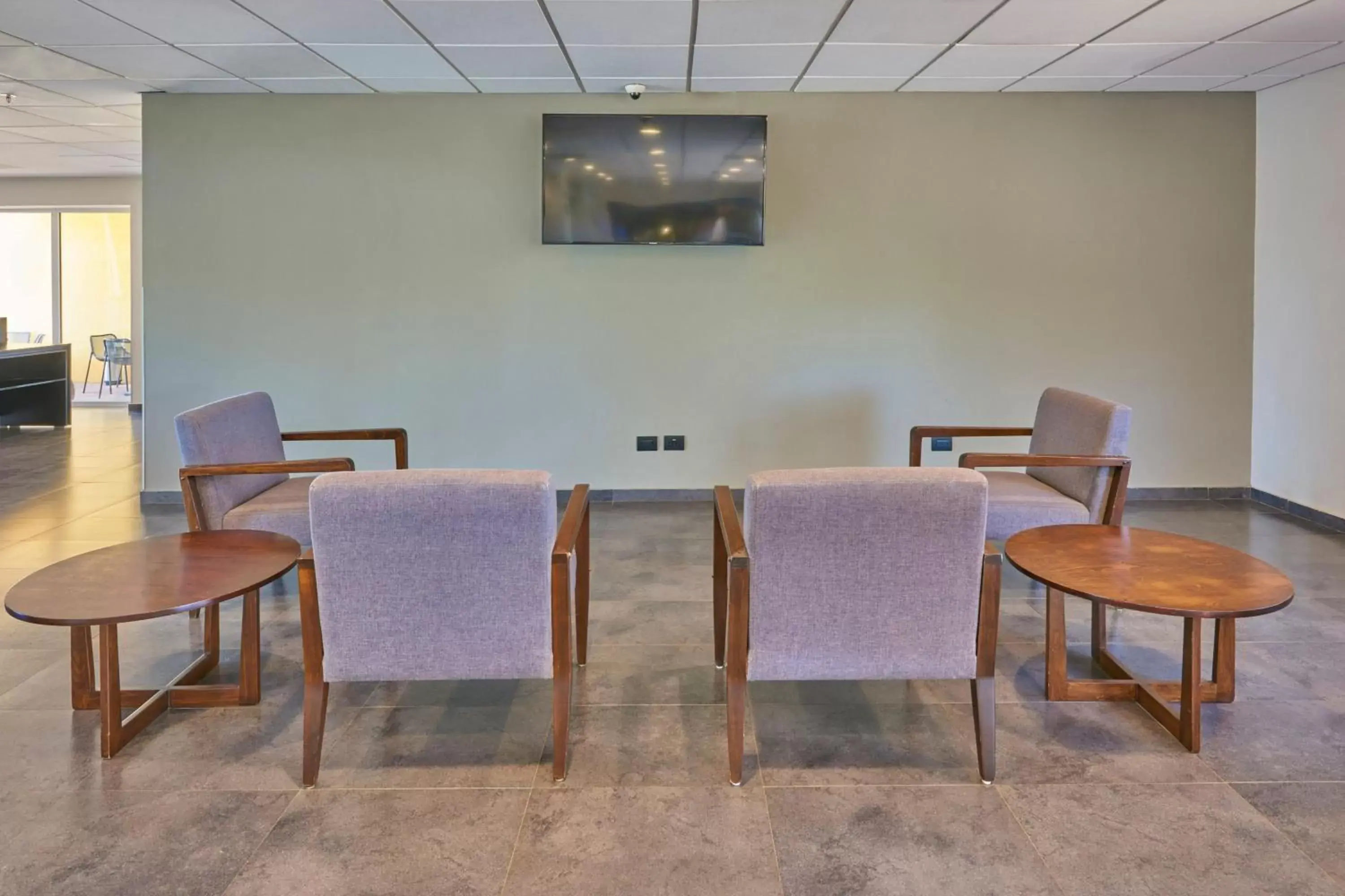 Lobby or reception in City Express by Marriott Cananea