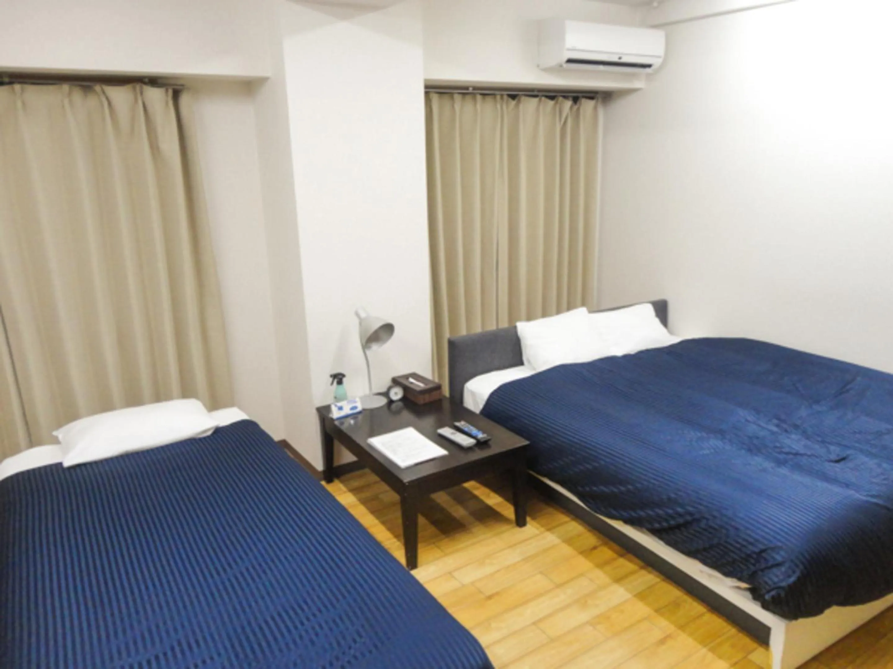 Bed in HOTEL LiVEMAX BUDGET Nagoya