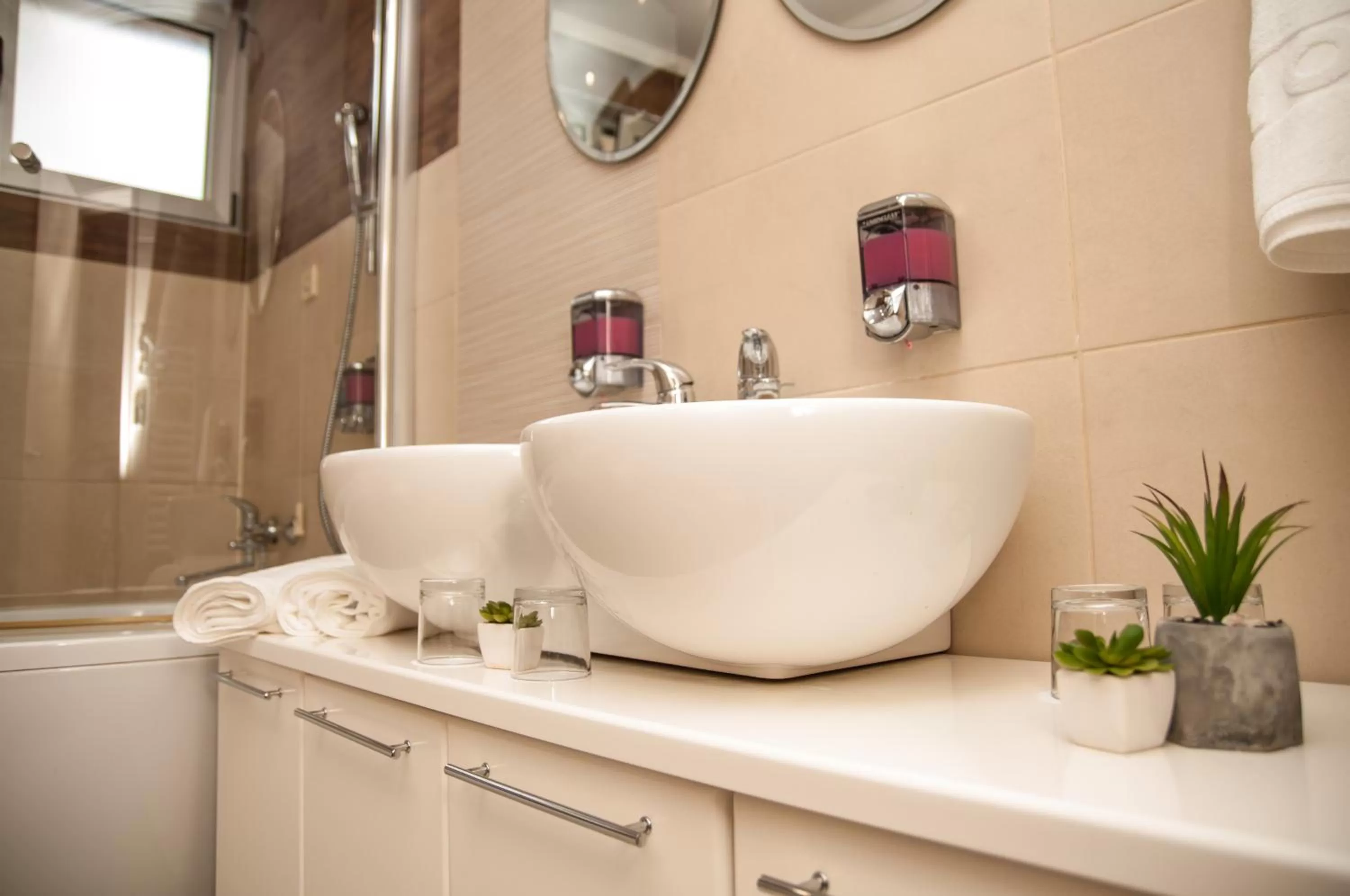 Bathroom in Garni Hotel Vigor - EV station