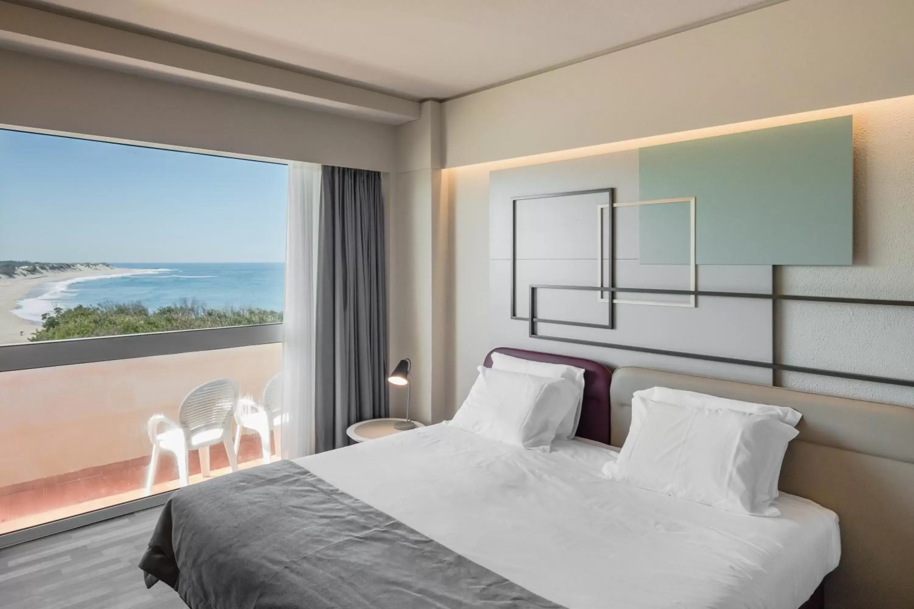 Balcony/Terrace, Bed in Axis Ofir Beach Resort Hotel Balcony/Terrace, Bed in Axis Ofir Beach Resort Hotel
