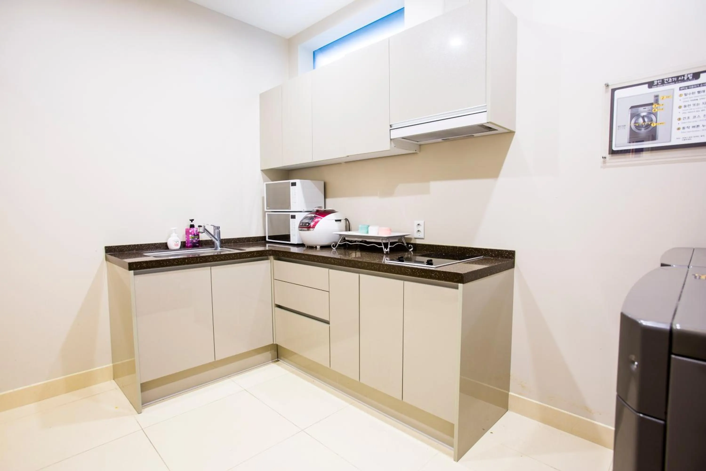 Kitchen or kitchenette in Polaris Hotel