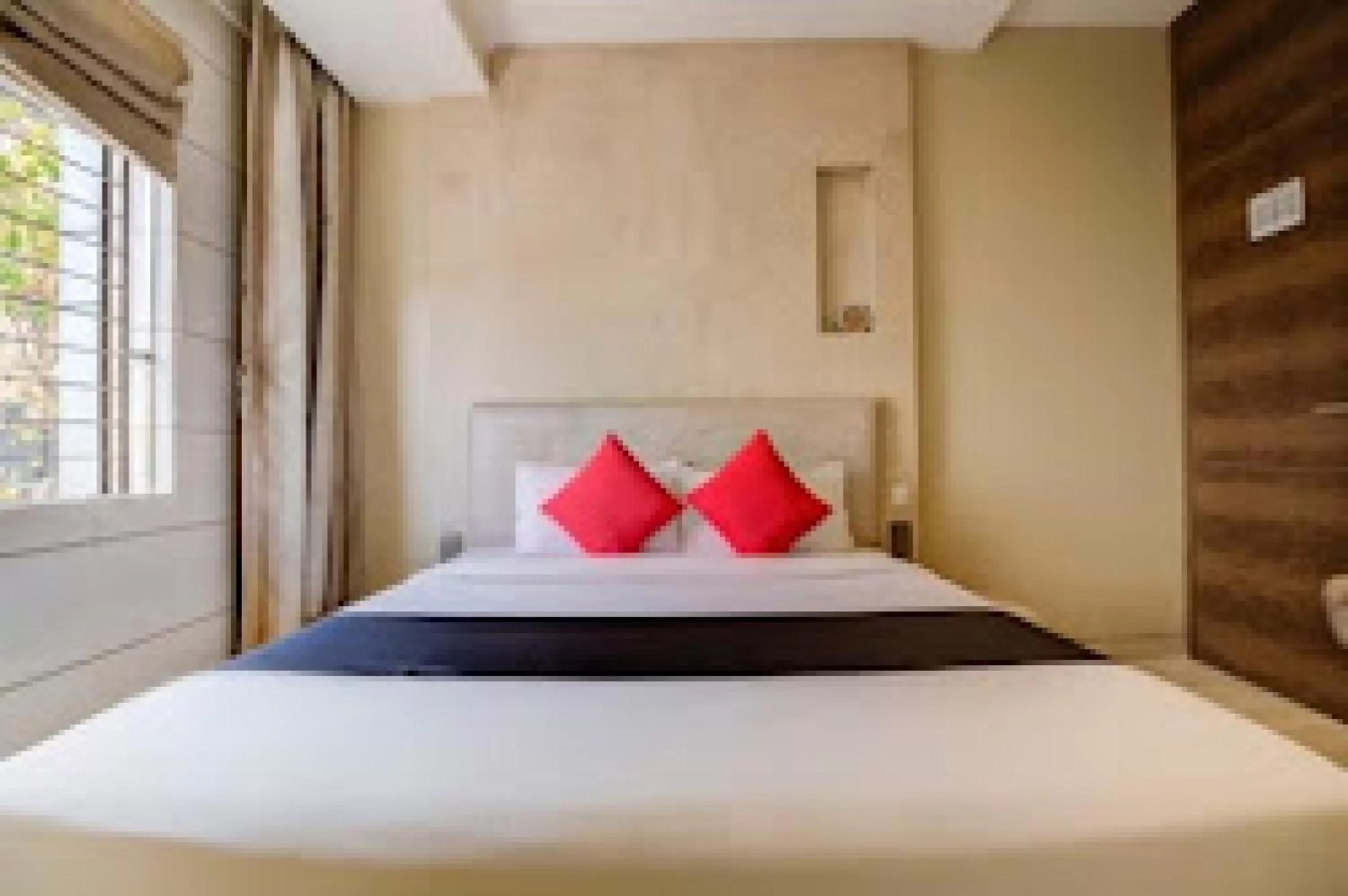 Bed in HOTEL PRATIKSHA RESIDENCY