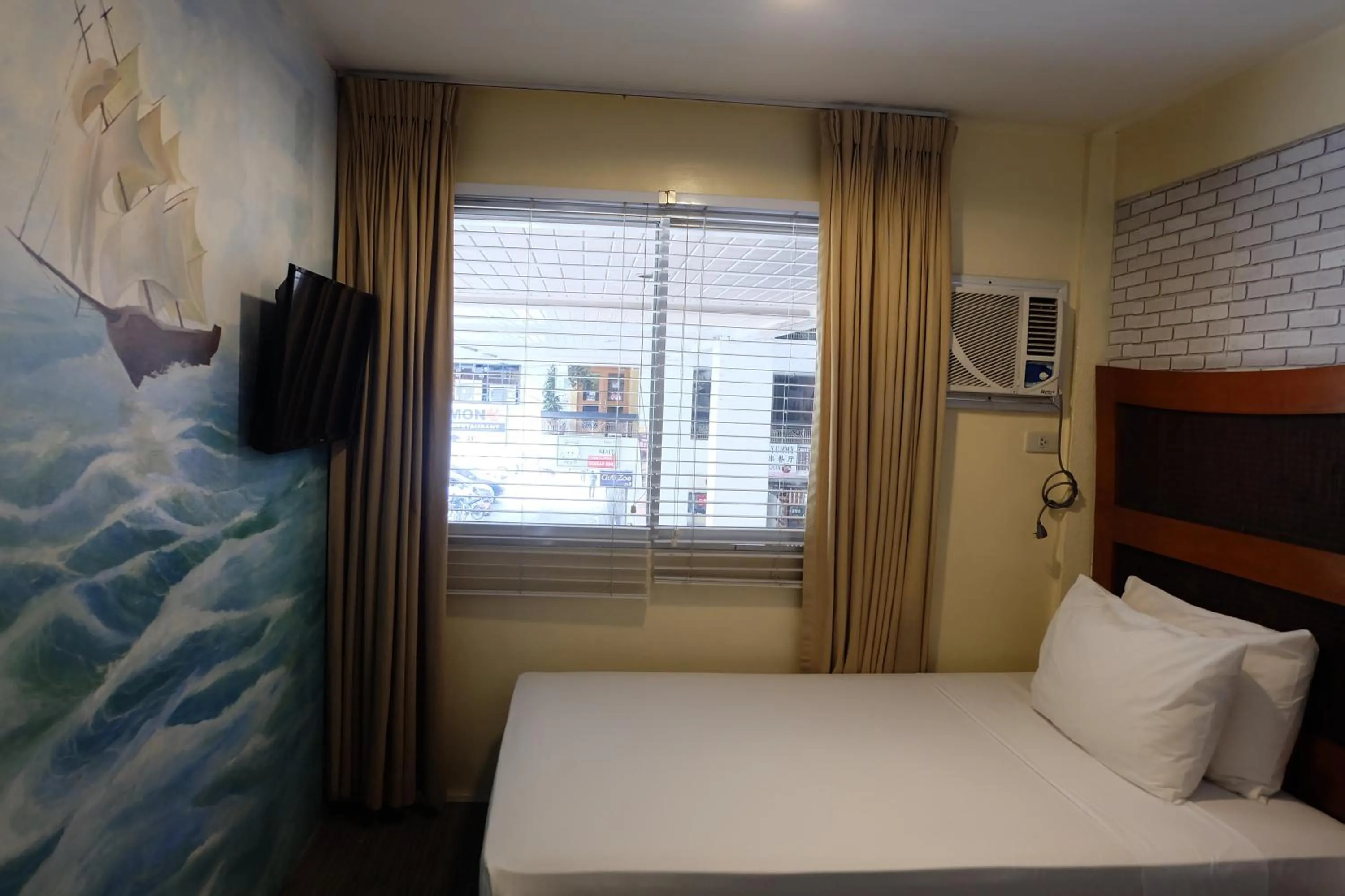 Bedroom, Bed in Spaces Hotel Makati