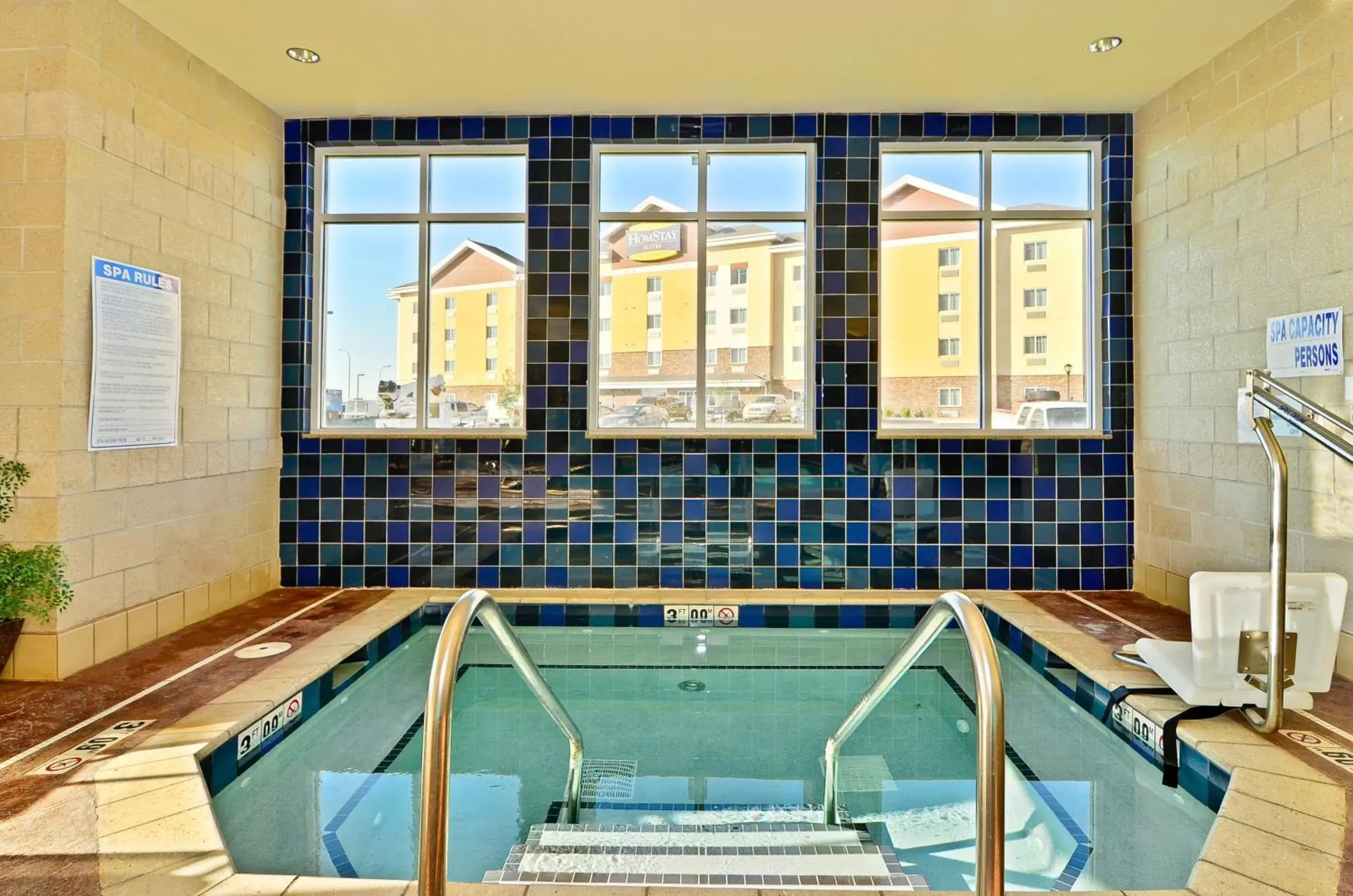 Swimming pool in Holiday Inn Express & Suites - Williston, an IHG Hotel