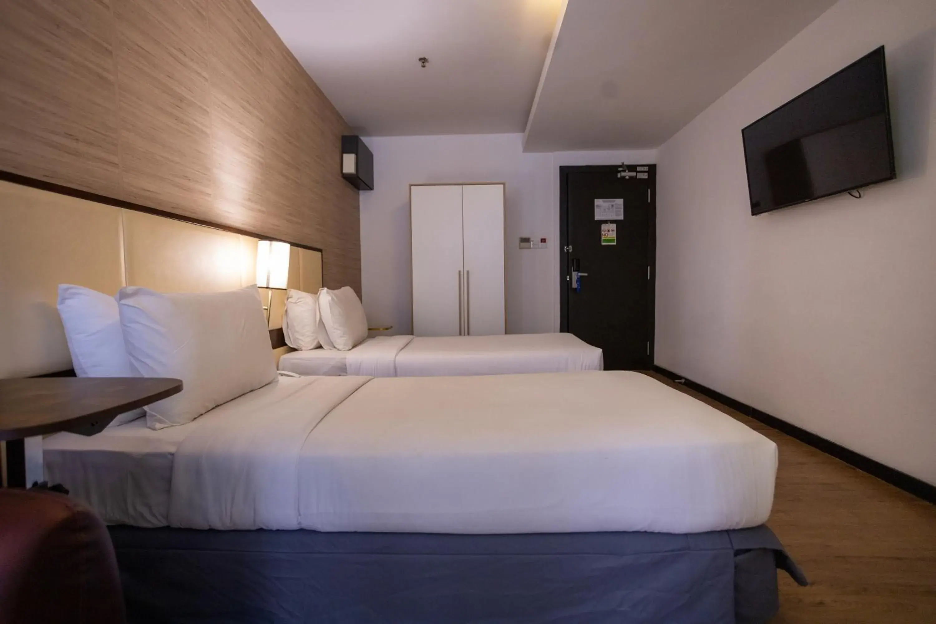 Communal lounge/ TV room, Bed in Citrus Hotel Johor Bahru by Compass Hospitality