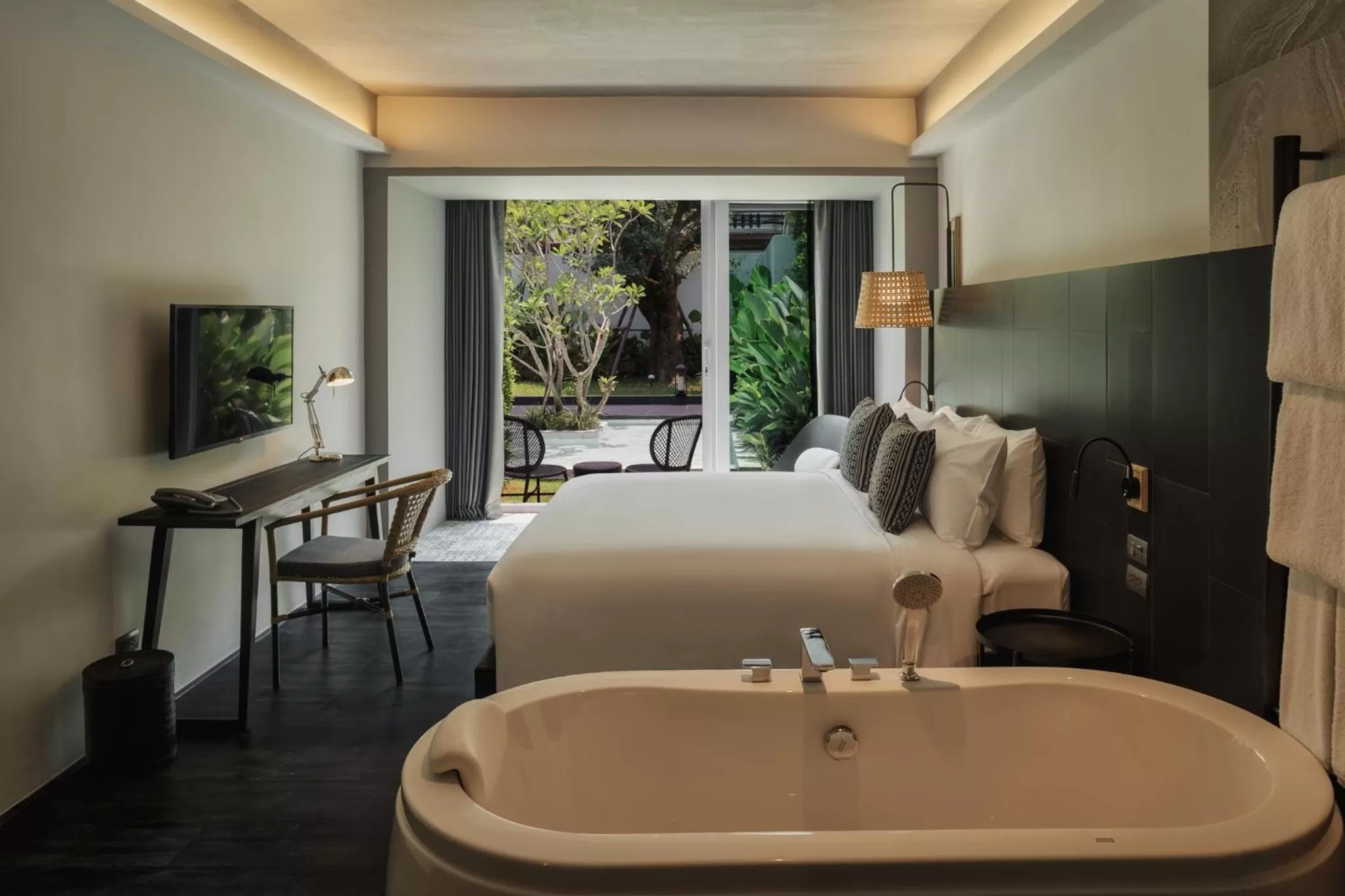 Bed in KIRI HOTEL Chiang Mai