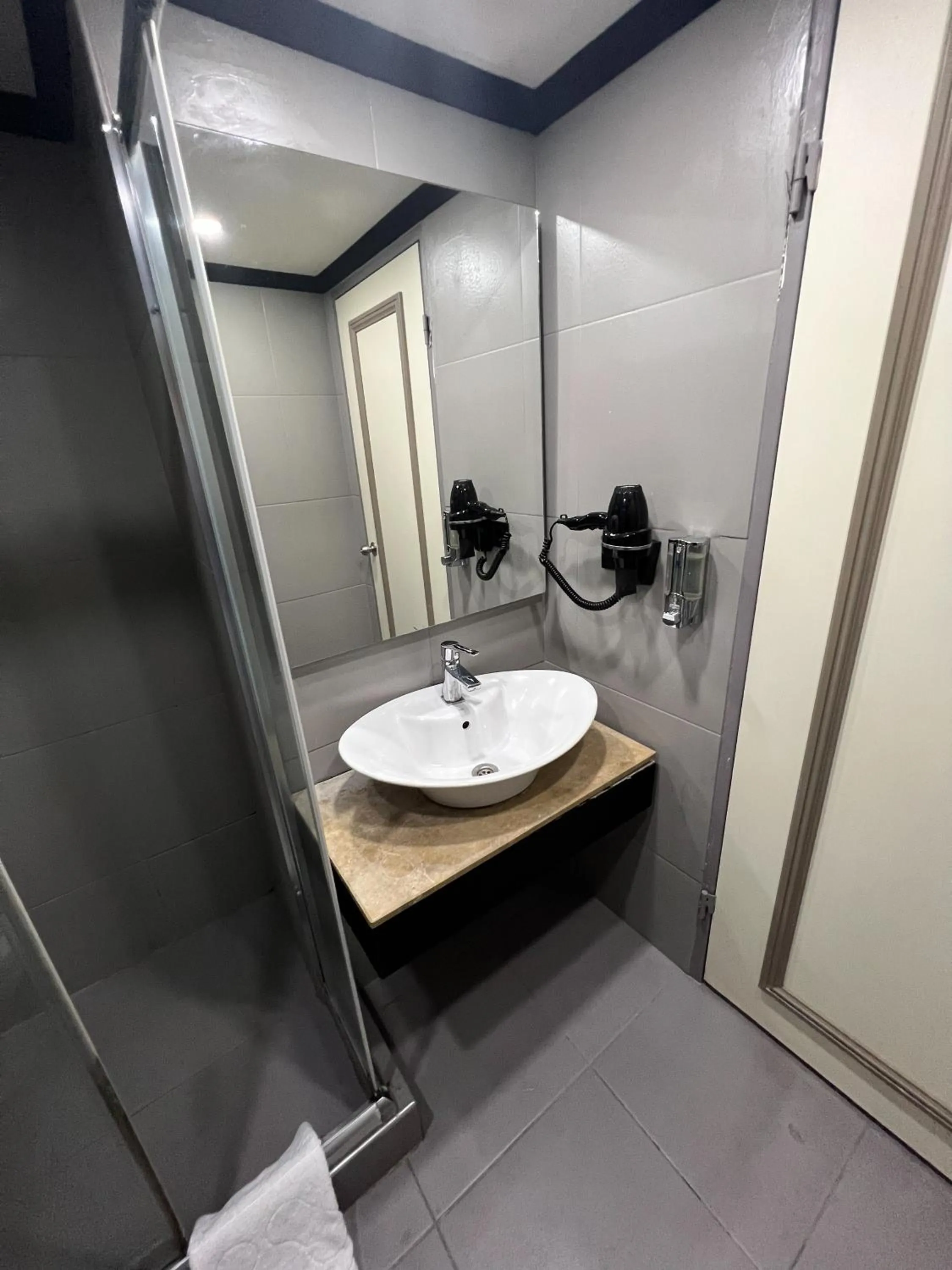 Bathroom in All Seasons Hotel