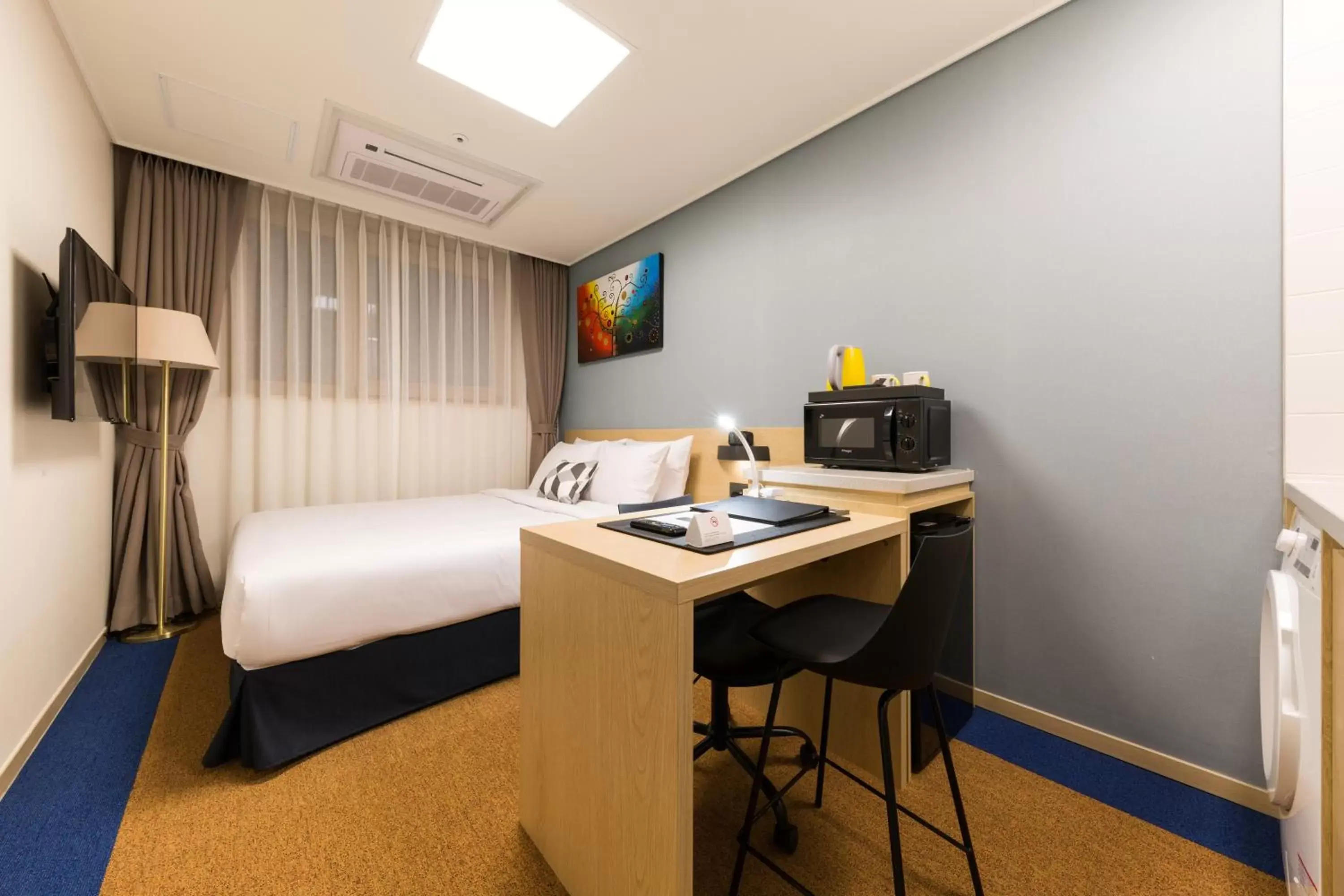 TV/Entertainment Center in Days Hotel & Suites by Wyndham Incheon Airport