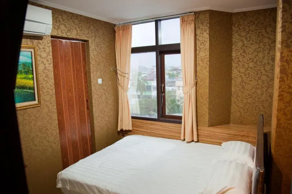 Bed in Hotel Rumah Shinta