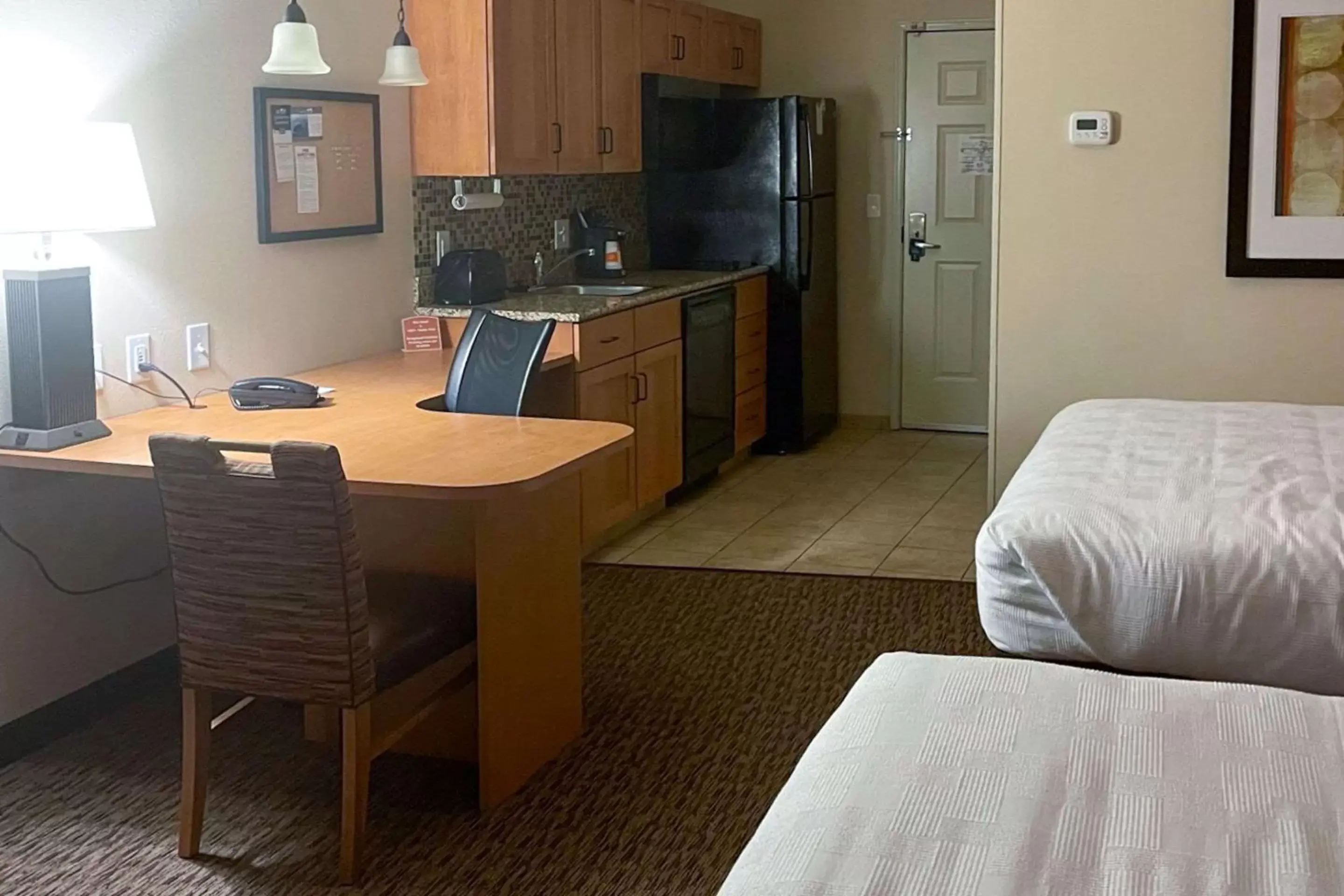 Bedroom, Kitchen/Kitchenette in MainStay Suites Sidney - Medical Center