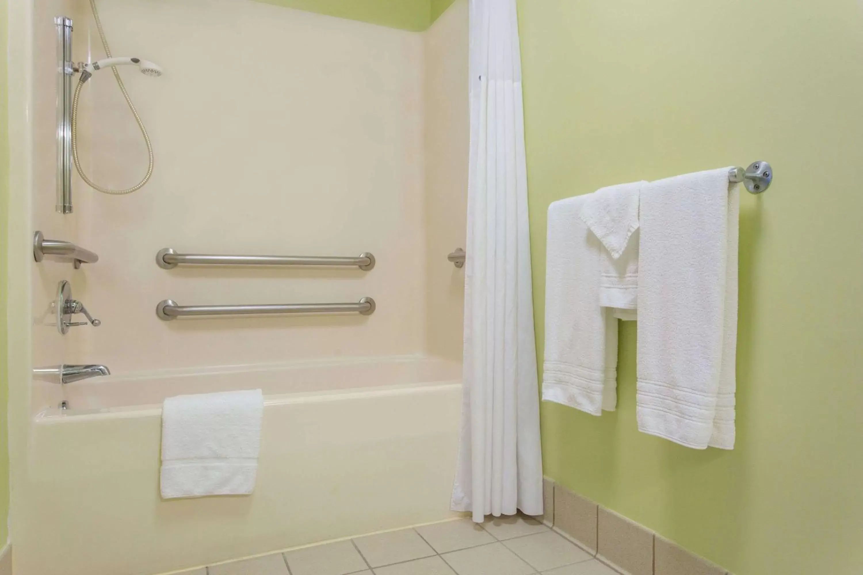 Bathroom in Days Inn by Wyndham Raleigh-Airport-Research Triangle Park