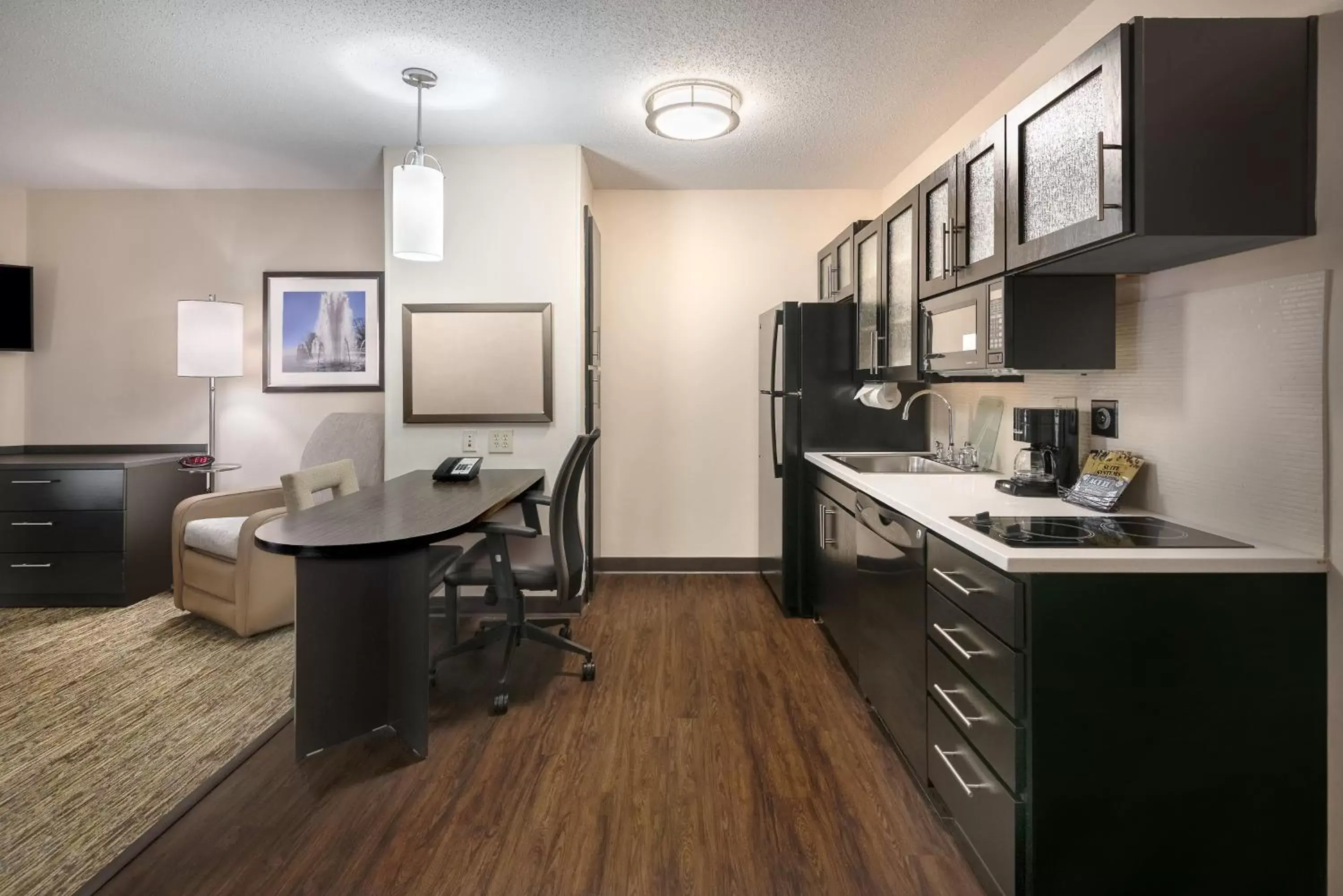 Photo of the whole room, Kitchen/Kitchenette in Candlewood Suites Sterling, an IHG Hotel