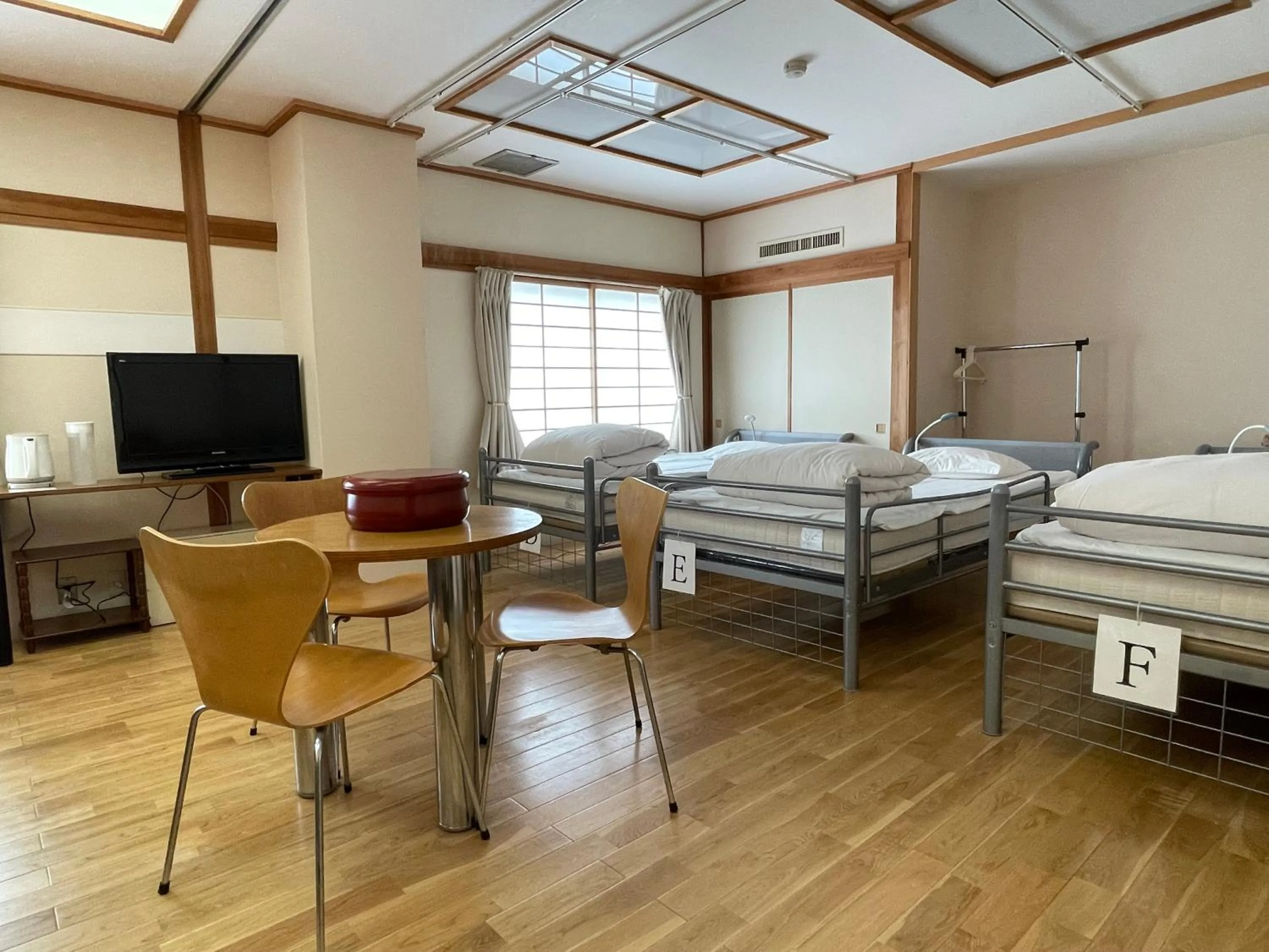 Bedroom, Bed in Kawaguchiko Station Inn