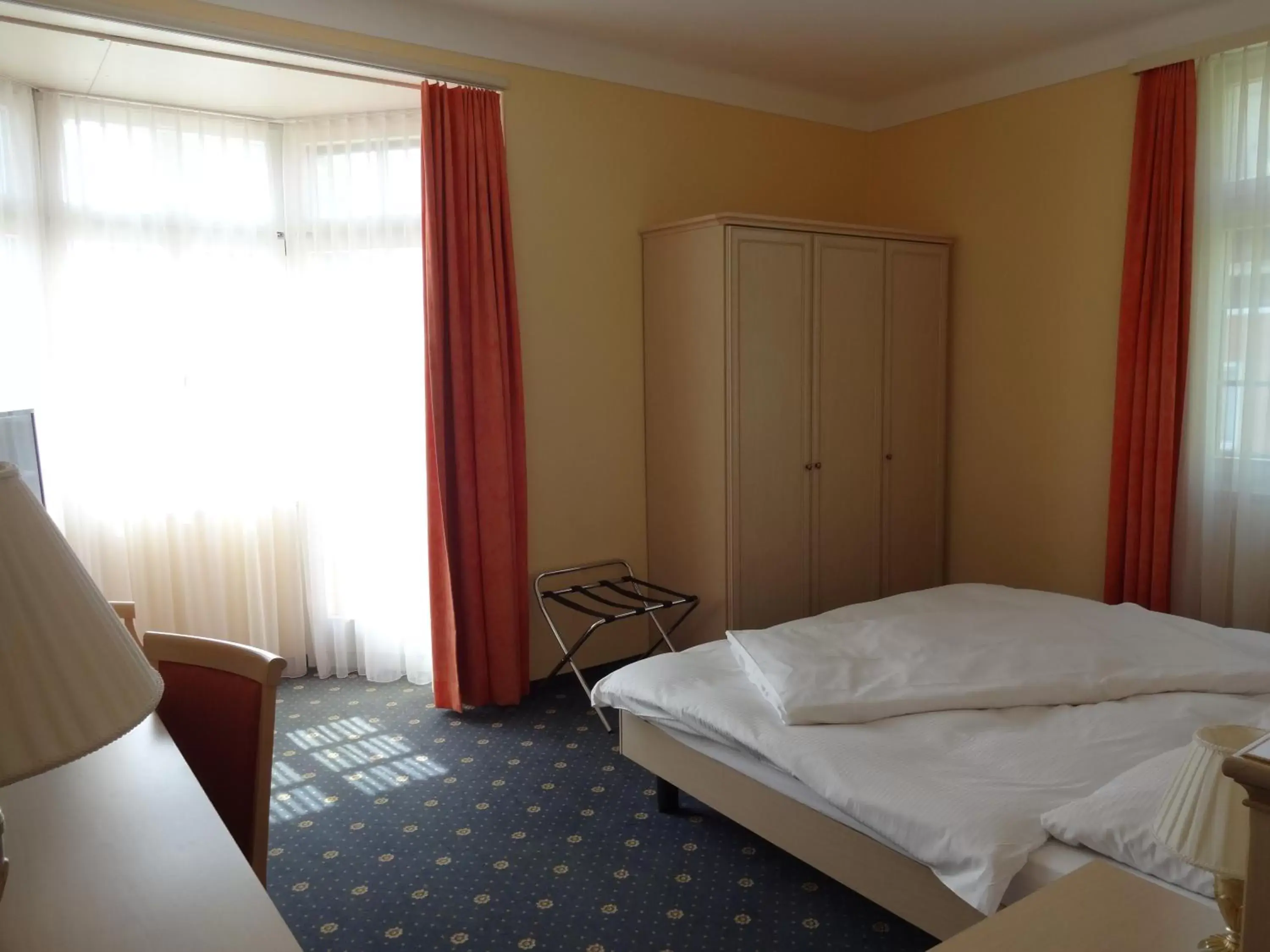 Photo of the whole room, Bed in Hotel Schweizerhof