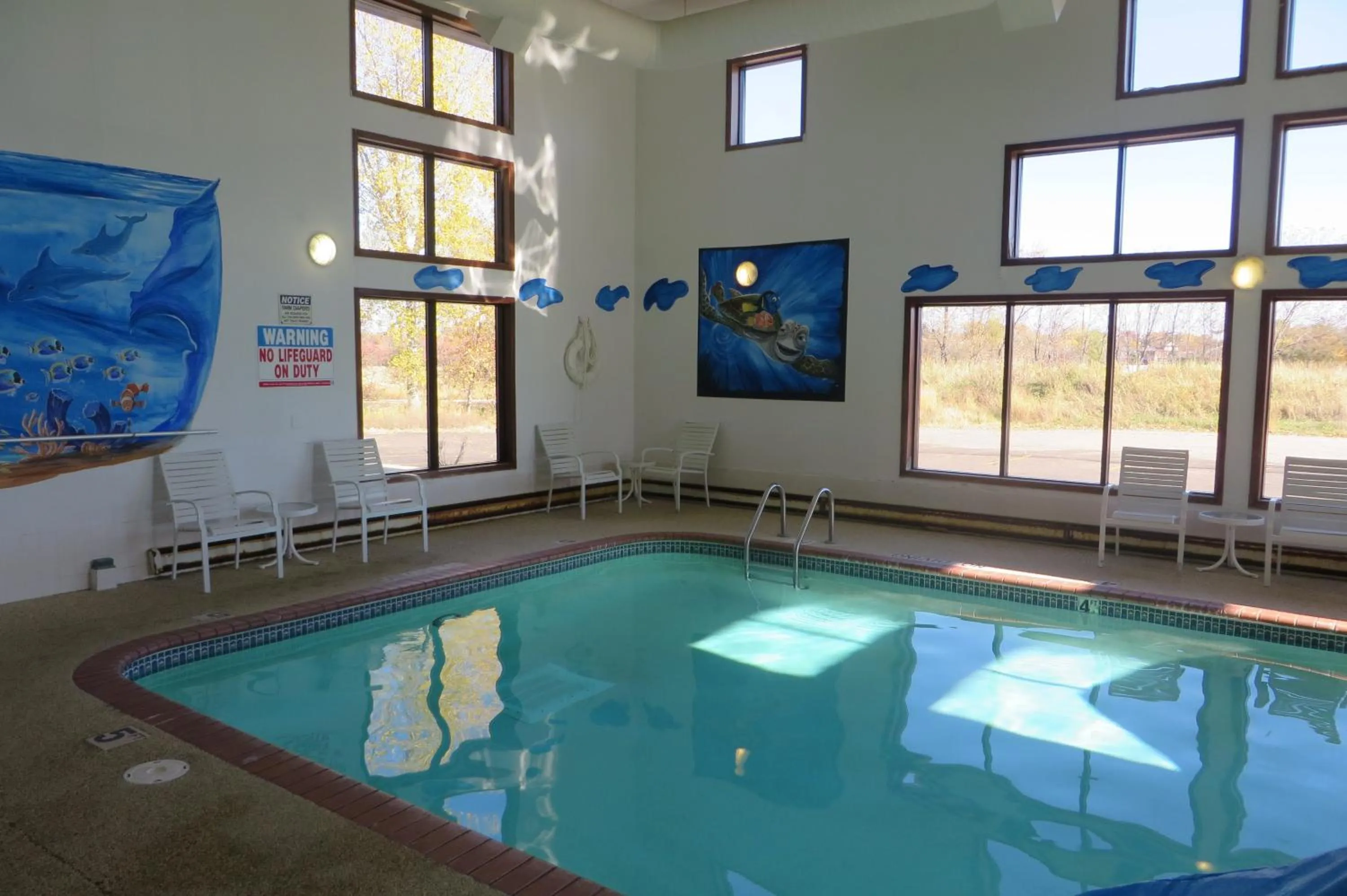 Swimming pool in AmericInn by Wyndham Forest Lake