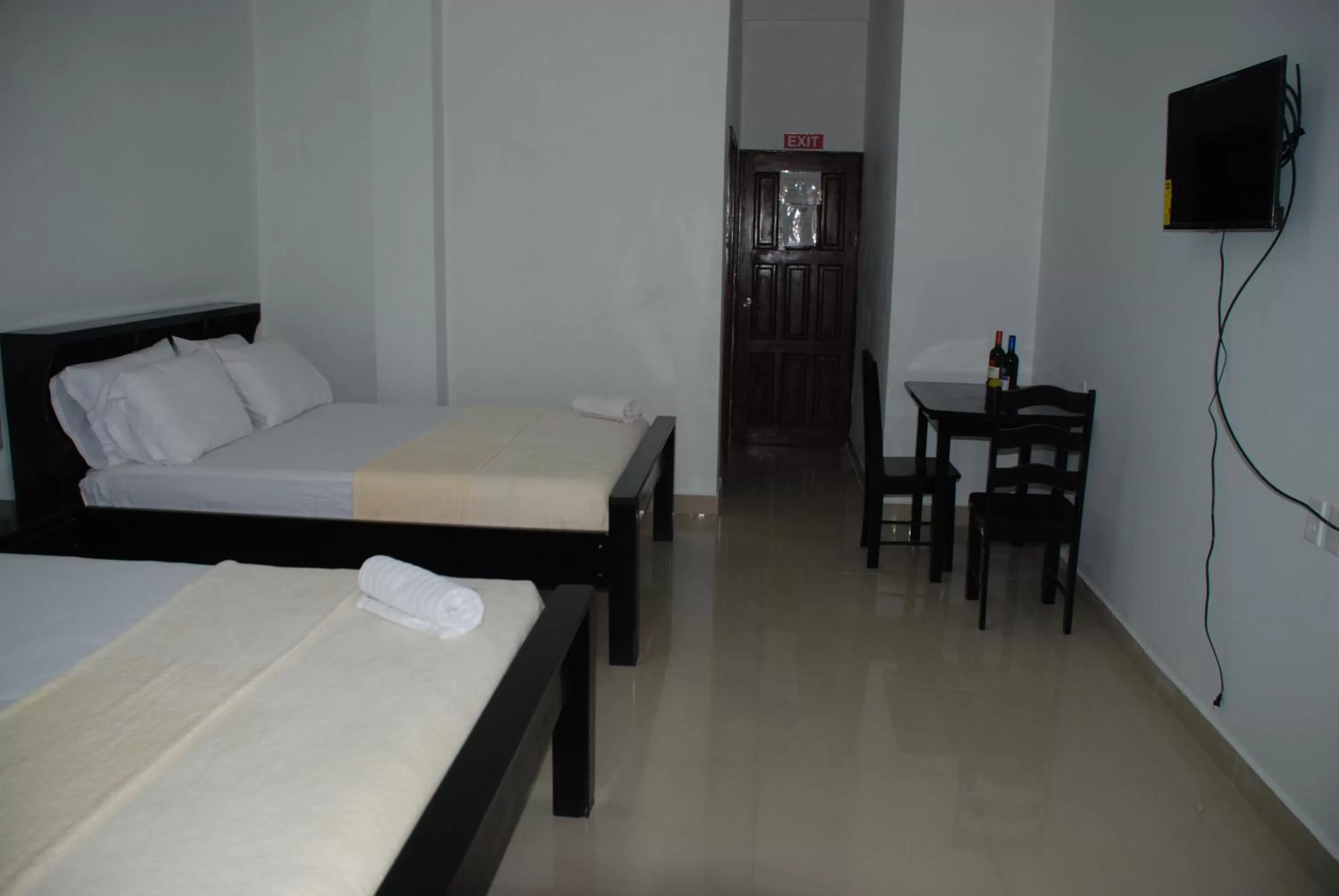 Bed in Hotel Coastalbay 2 & Golf Cart Rental