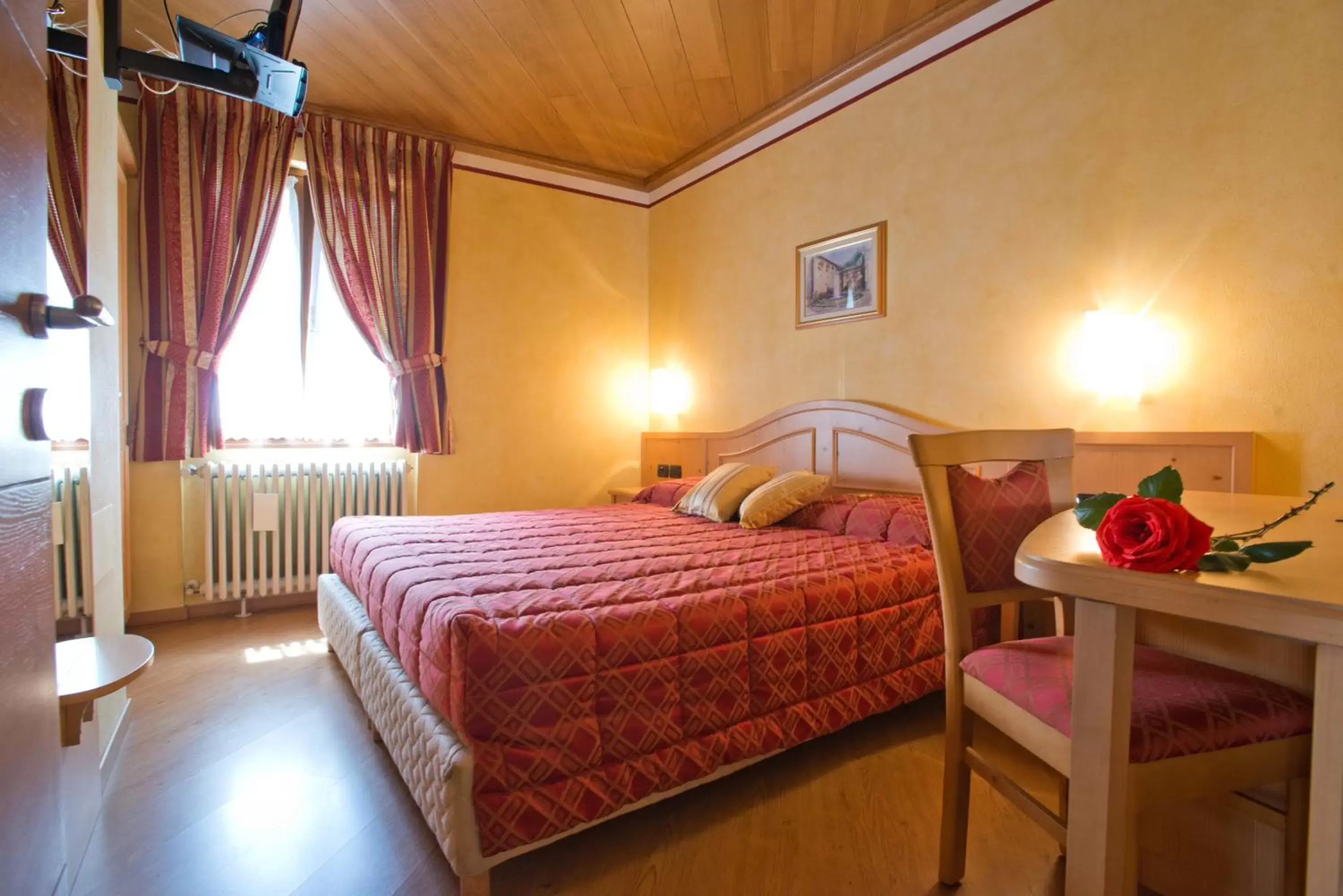 Bed in Hotel Garni Le Corti