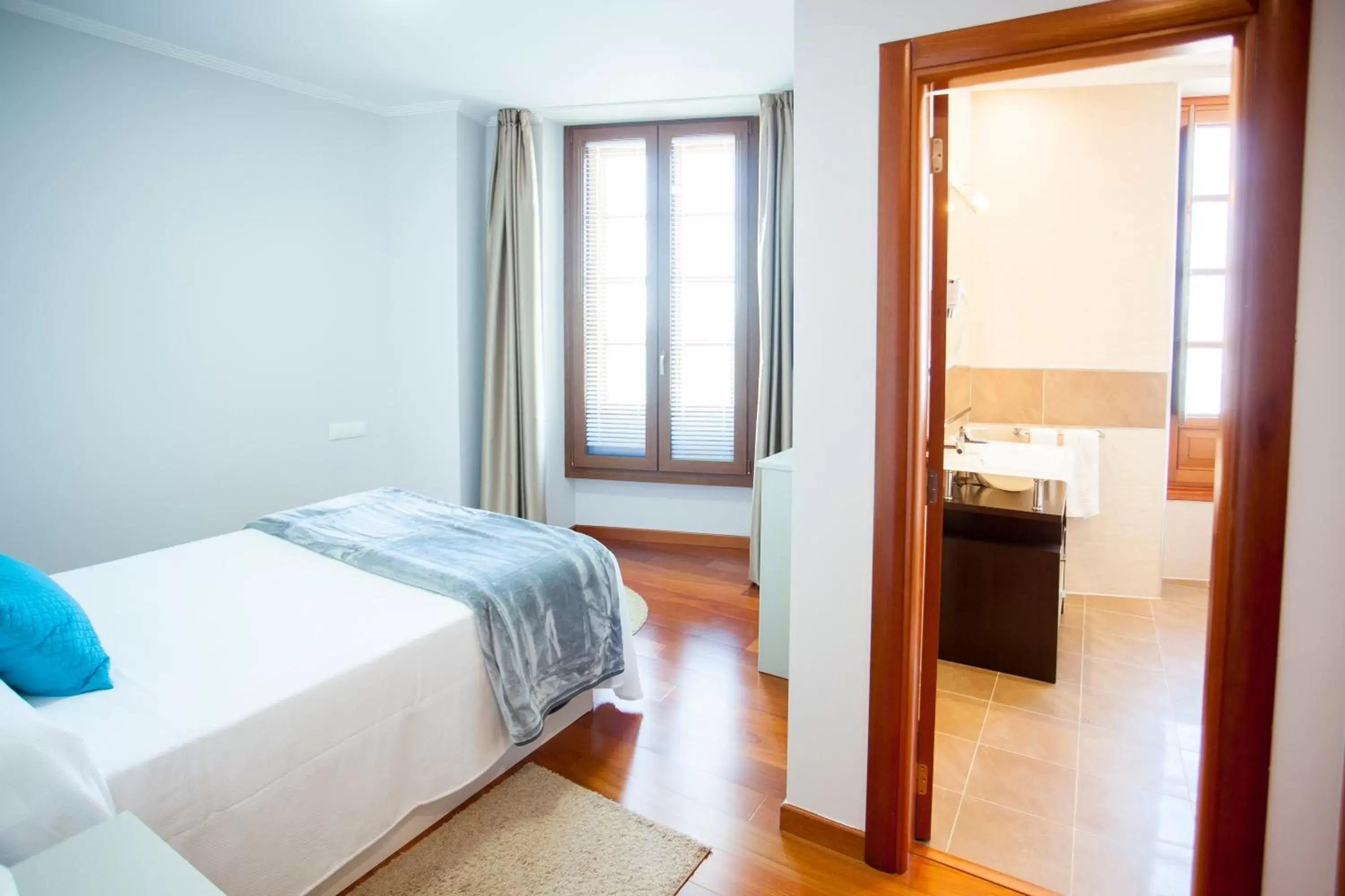 View (from property/room), Bed in Apartamentos Villa Zoila Baiona