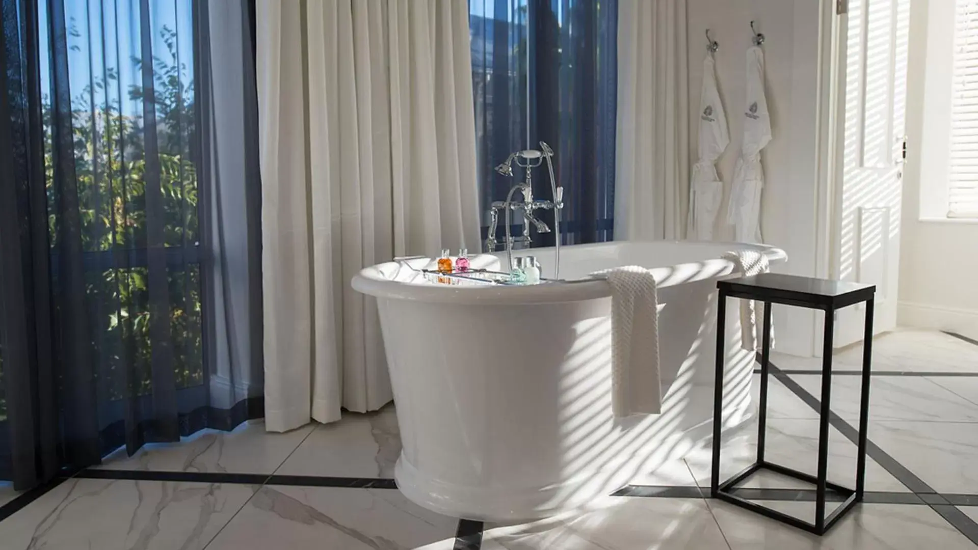 Bathroom in The Manor House at the Queen Victoria Hotel by NEWMARK