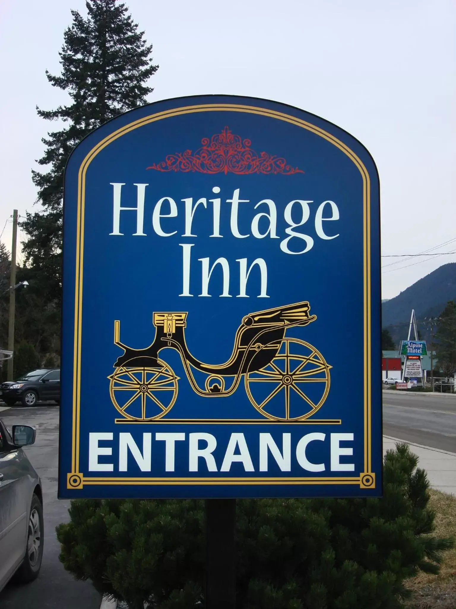 Property logo or sign in Heritage Inn