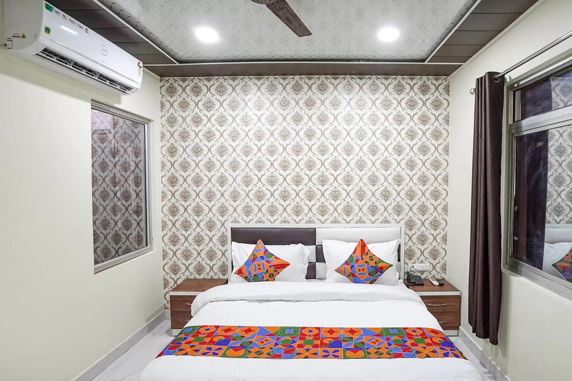 Bed in FabHotel Rajdhani